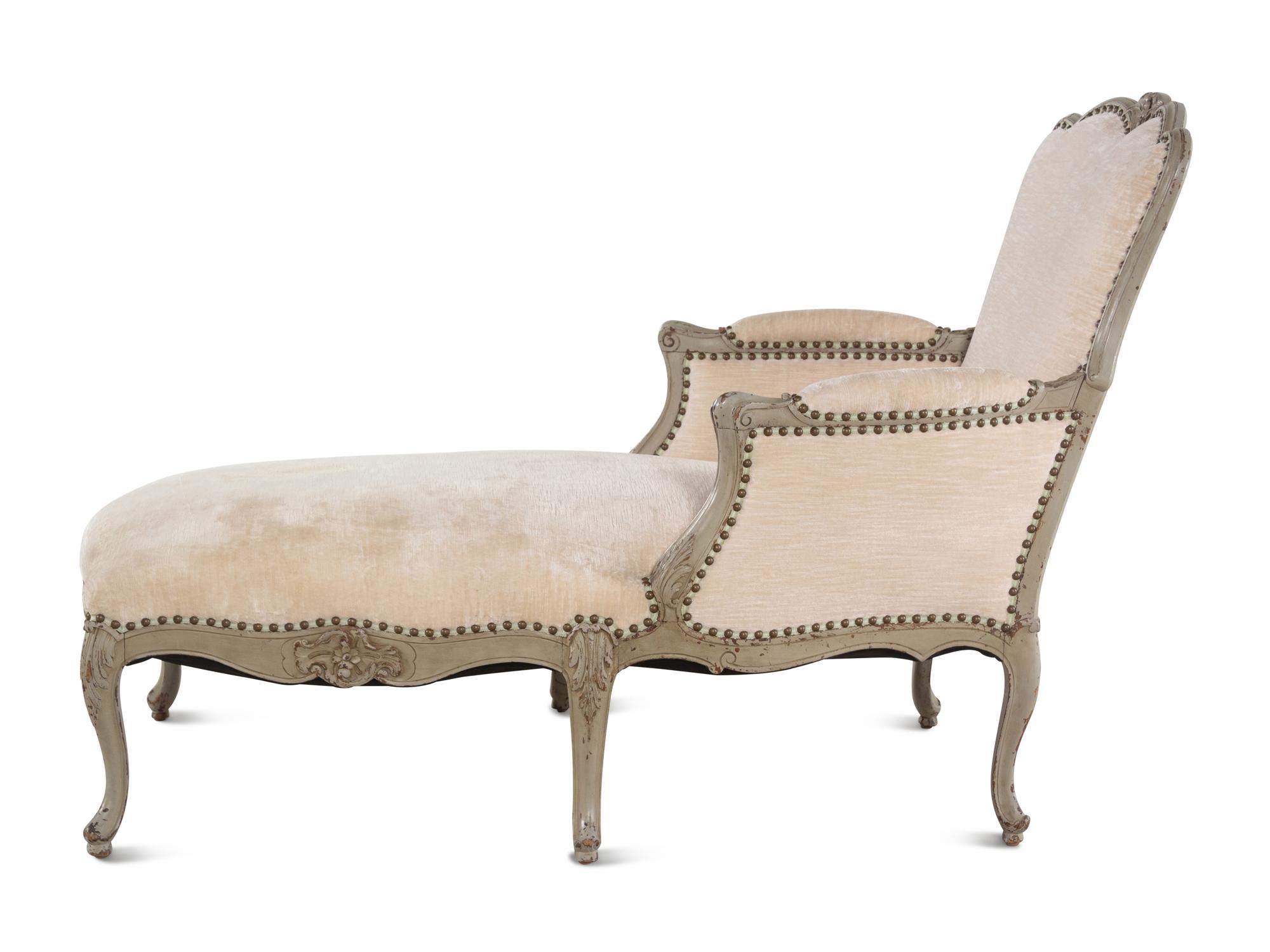 A Louis XV Style Carved and Painted Chaise Longue