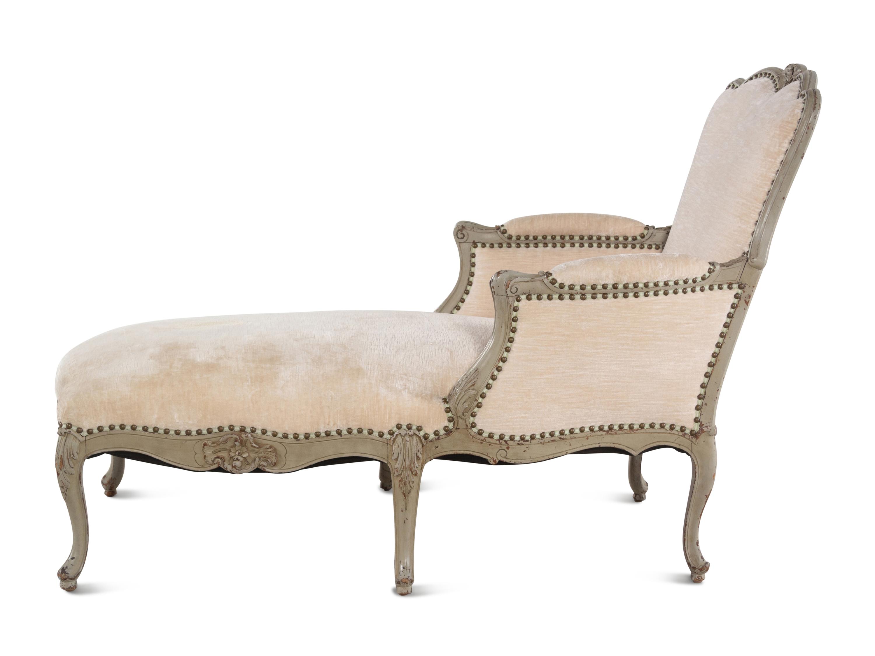 A Louis XV Style Carved and Painted Chaise Longue