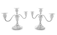 A Pair of American Silver Three-Light Candelabra, Mueck-Carey Co., New York, NY, the central urn form cup issuing two reed decorated S-