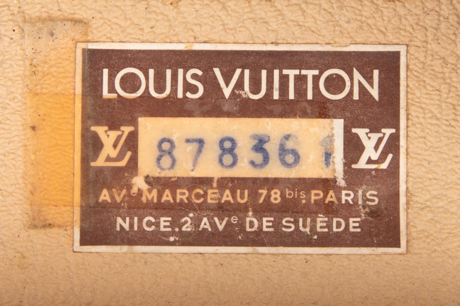 A Group of Seven Louis Vuitton Hardside Suitcases
