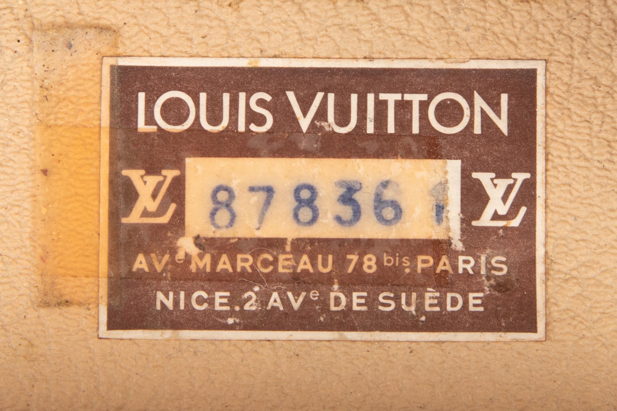 A Group of Seven Louis Vuitton Hardside Suitcases