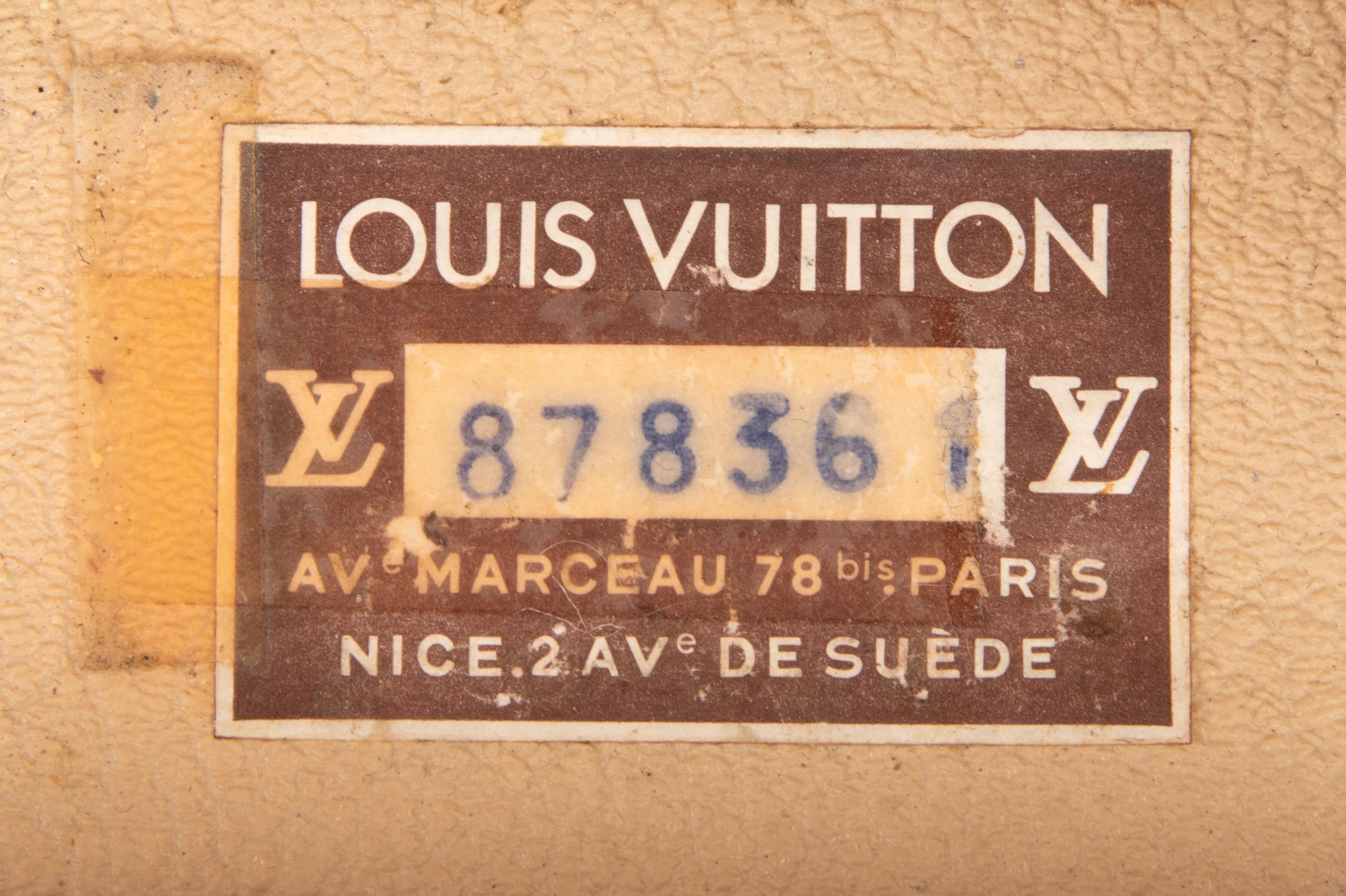 A Group of Seven Louis Vuitton Hardside Suitcases