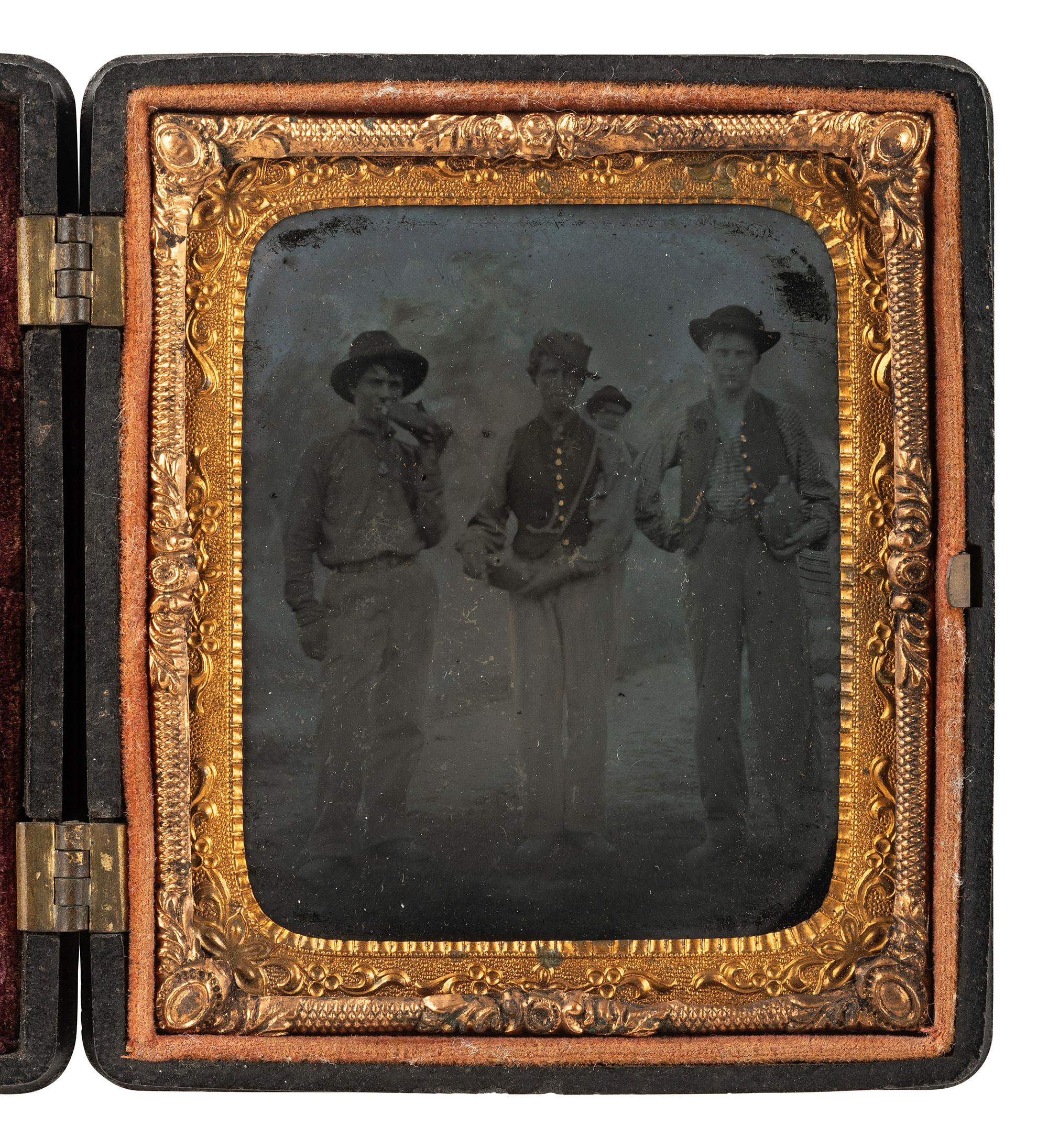 [CIVIL WAR]. Sixth plate outdoor tintype featuring a trio of Union pards showing off their canteens.