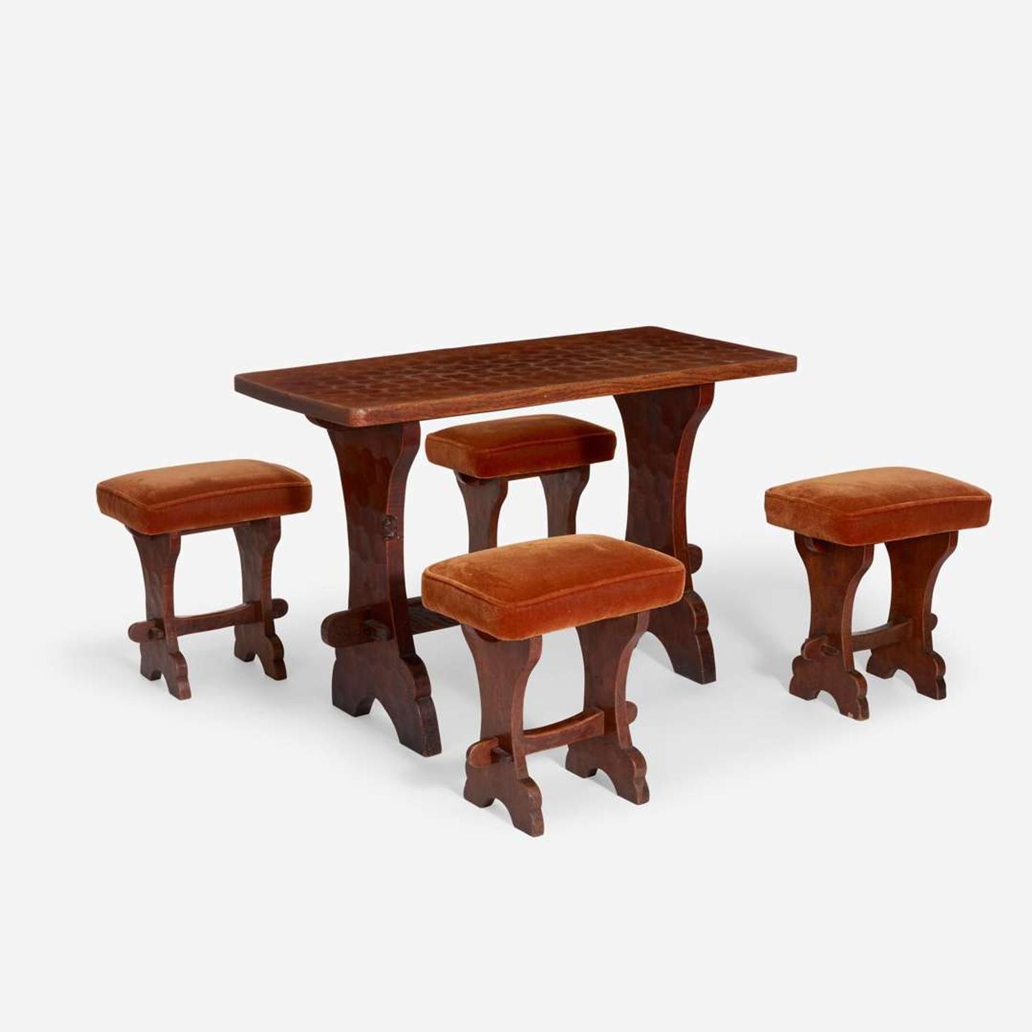 An Arts & Crafts Gnomeman Oak Table with Four Conforming Stools Tom 'Gnomeman' Whittaker (British 1910–1991), circa 1950