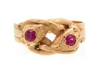 A Rose Gold and Ruby Double Snake Ring, 4.20 dwts.