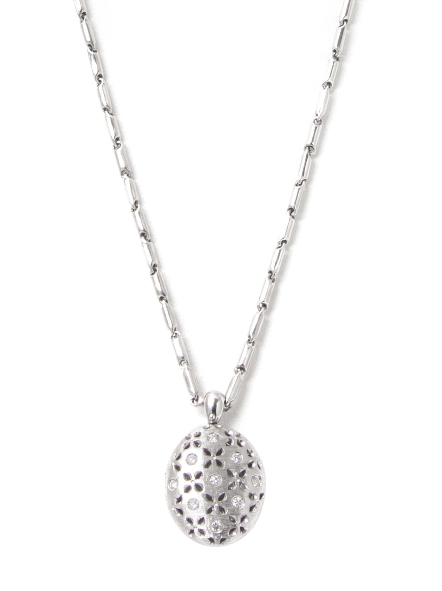 An 18 Karat White Gold, Diamond and Ruby Locket with Chain, Roberto Coin, 10.20 dwts.