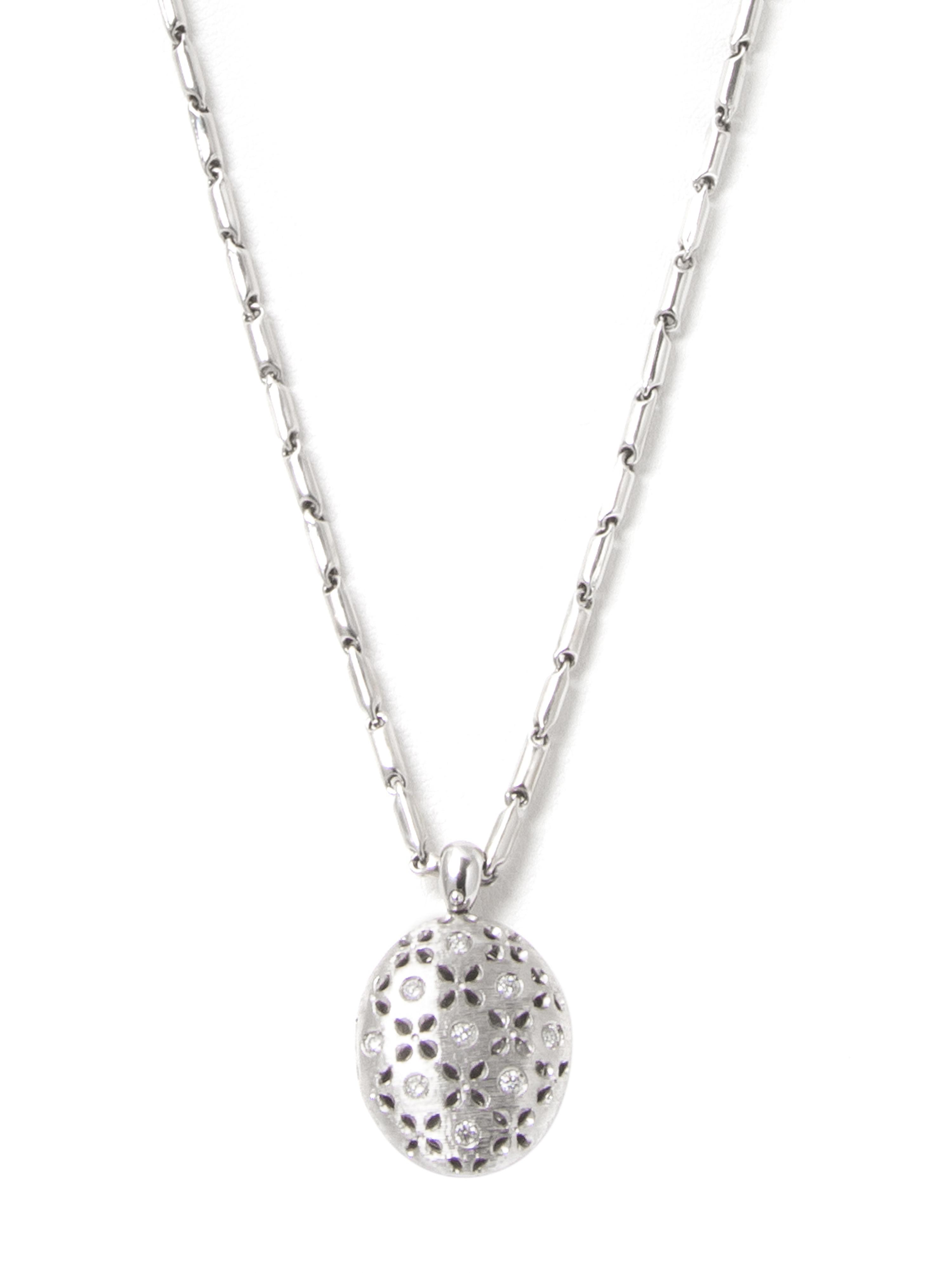 An 18 Karat White Gold, Diamond and Ruby Locket with Chain, Roberto Coin, 10.20 dwts.