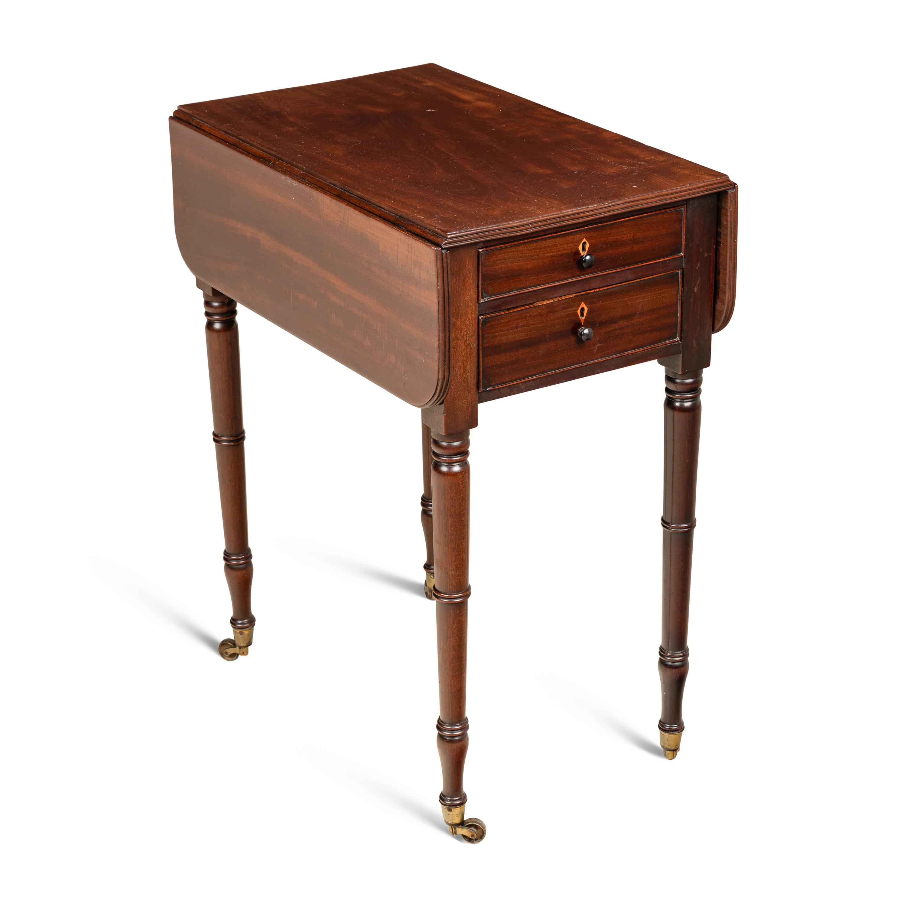 An English Mahogany Work Table