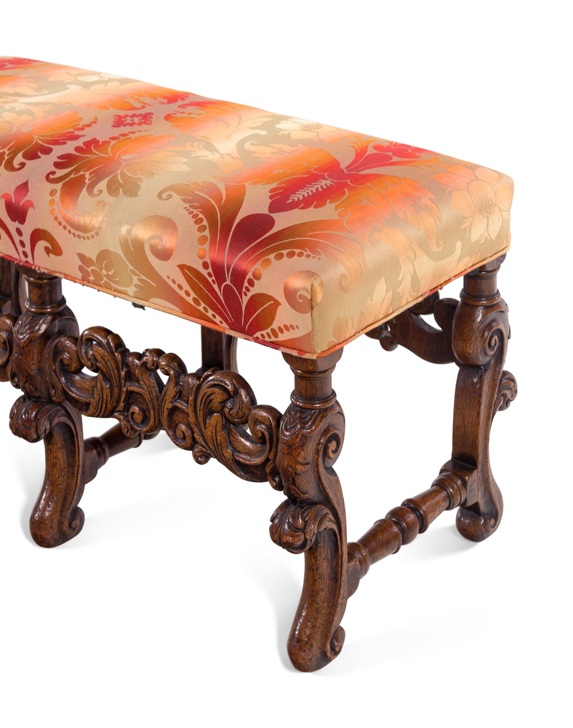 A Pair of William and Mary Style Carved Walnut Benches