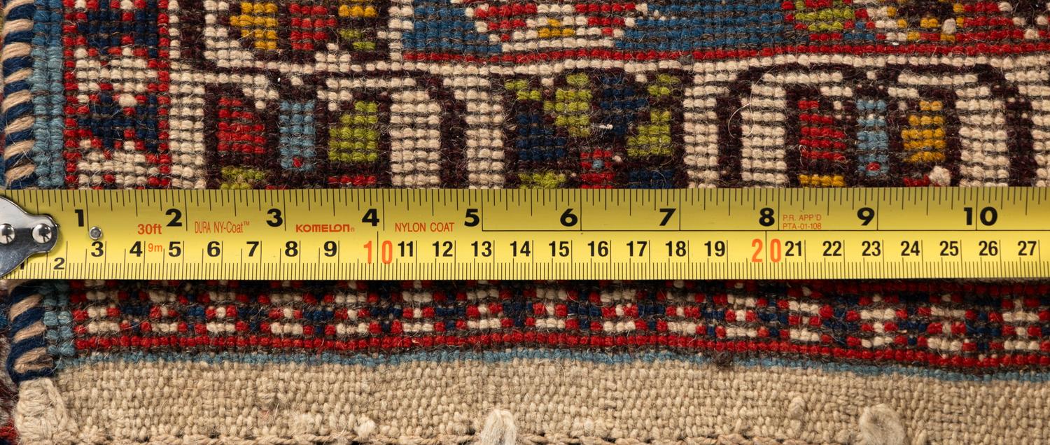 A Group of Three Wool Rugs