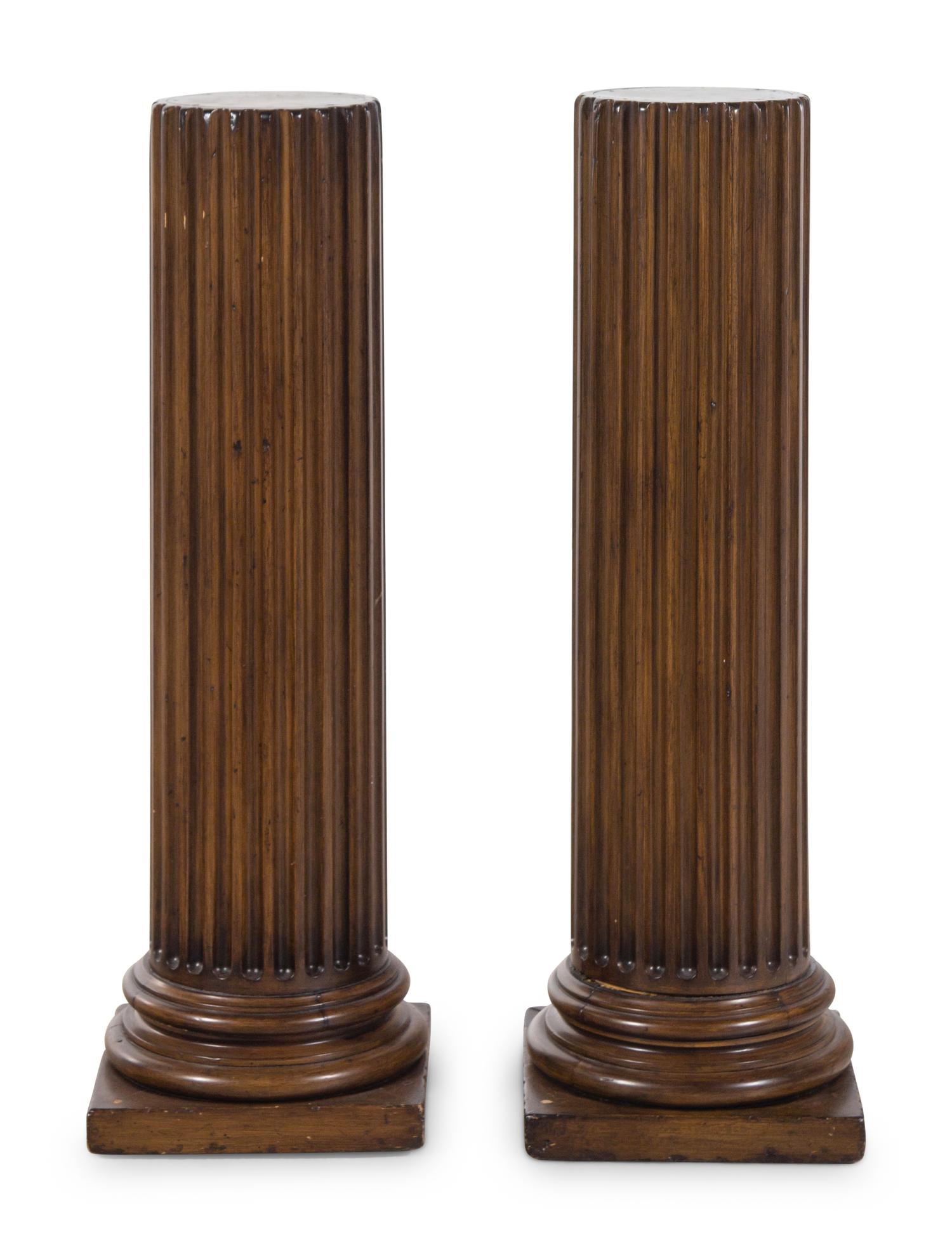 A Pair of Fluted Columnar Walnut Pedestals