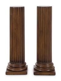 A Pair of Fluted Columnar Walnut Pedestals