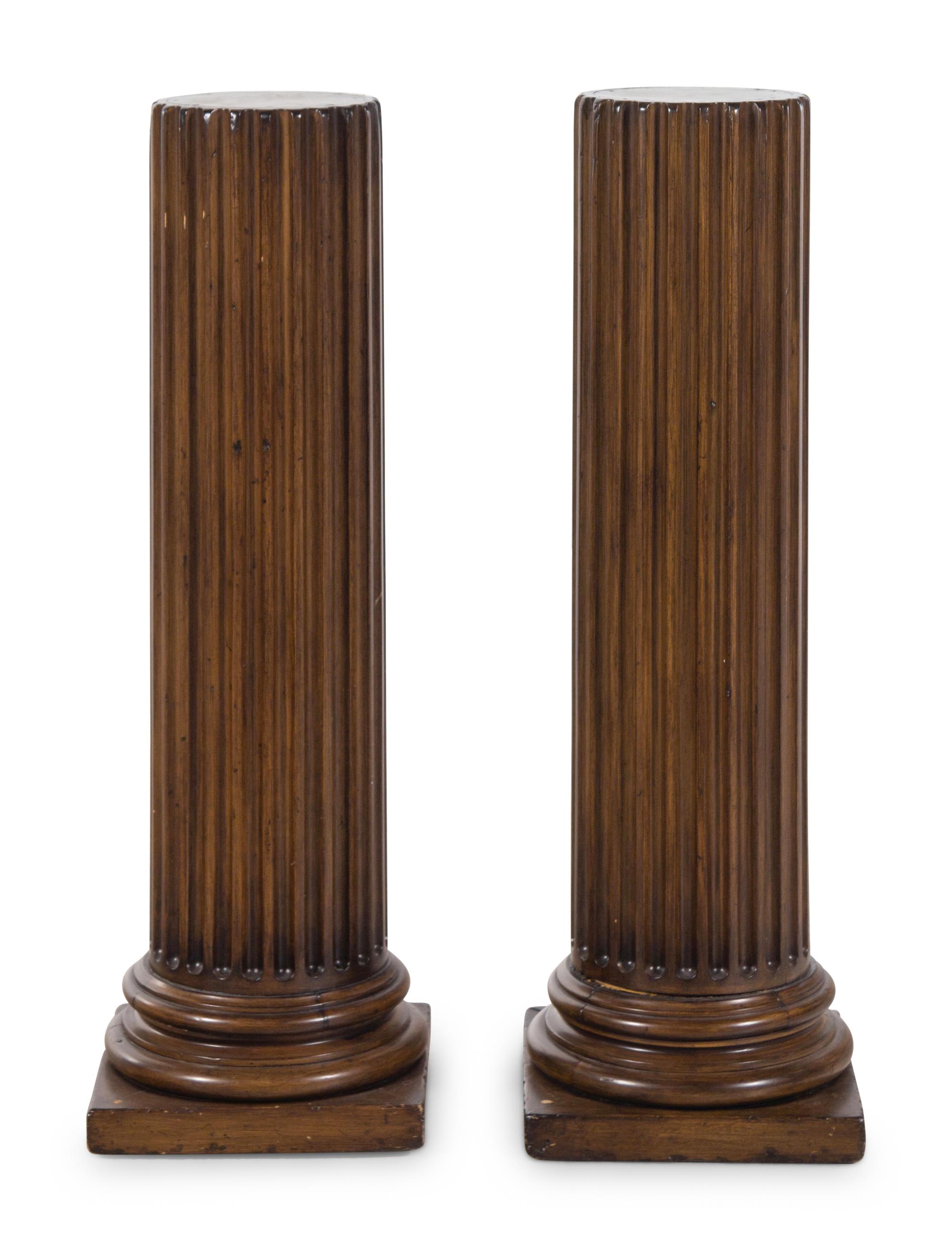 A Pair of Fluted Columnar Walnut Pedestals