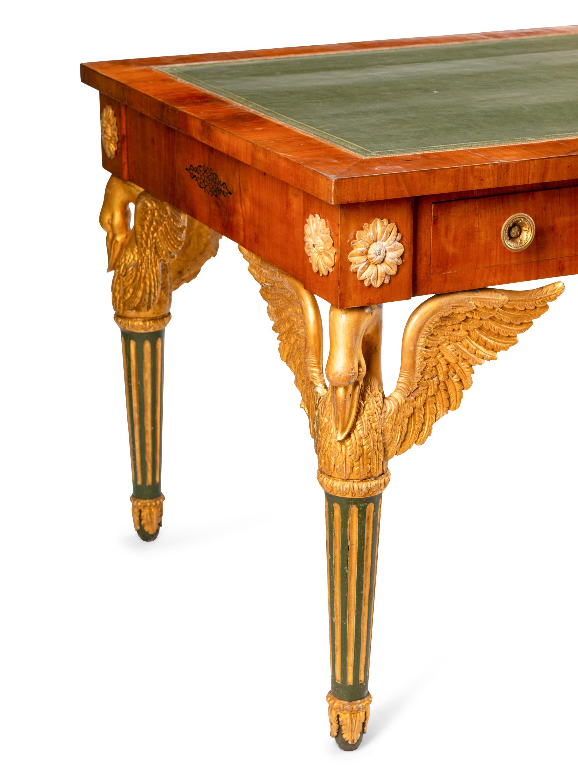 An Austrian Empire Style Fruitwood Veneered, Painted and Parcel Gilt Bureau Plat