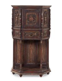 A Gothic Revival Oak Cabinet on Stand