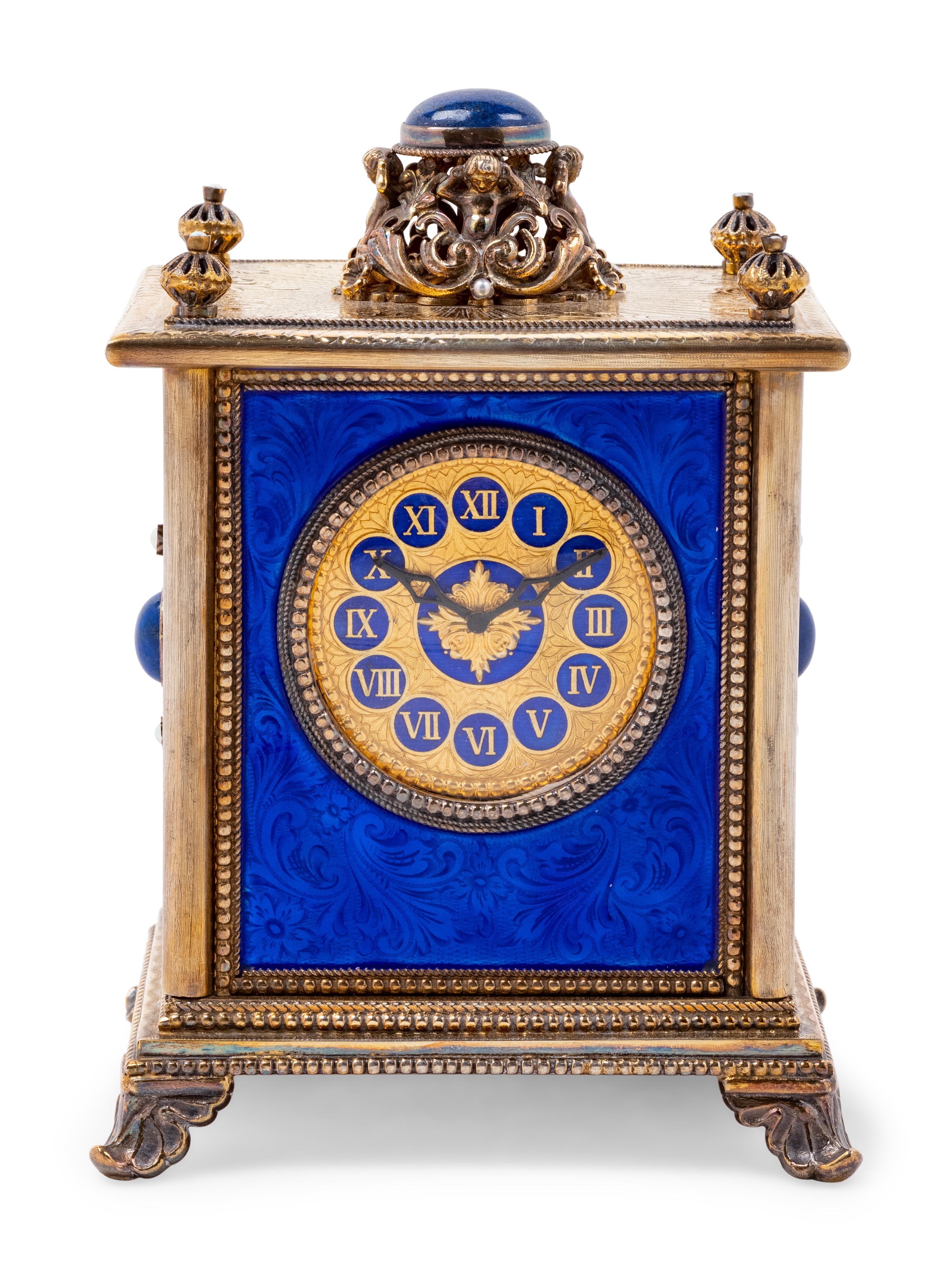 A Continental Blue Hardstone and Cultured Pearl Inset Gilt Metal and Enameled Table Clock