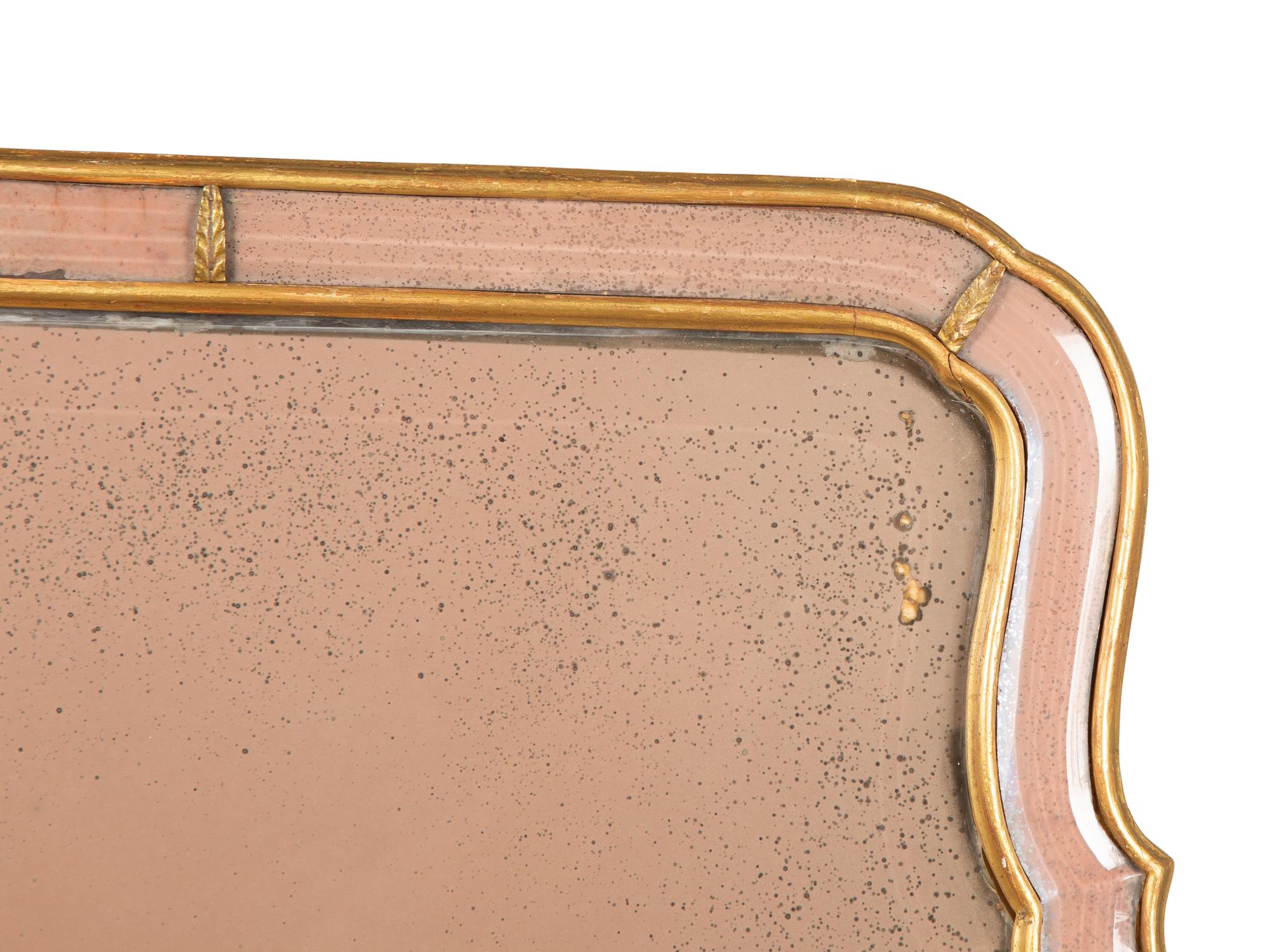 A Friedman Brothers George III Style Rose-Tinted Glass and Giltwood Mirror