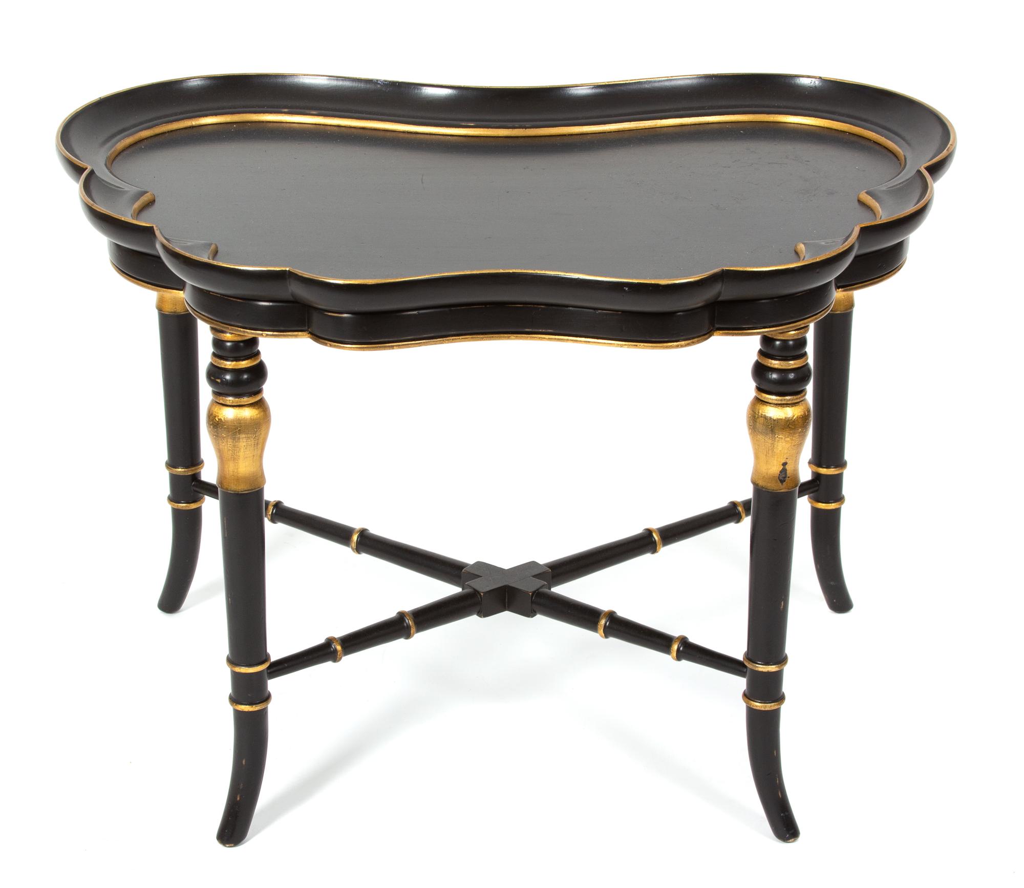 A Regency Style Black Lacquer Tray Top Table with Gilt Accents Height 20 3/4 x width 30 x depth 20 3/4 inches. — 20TH CENTURY