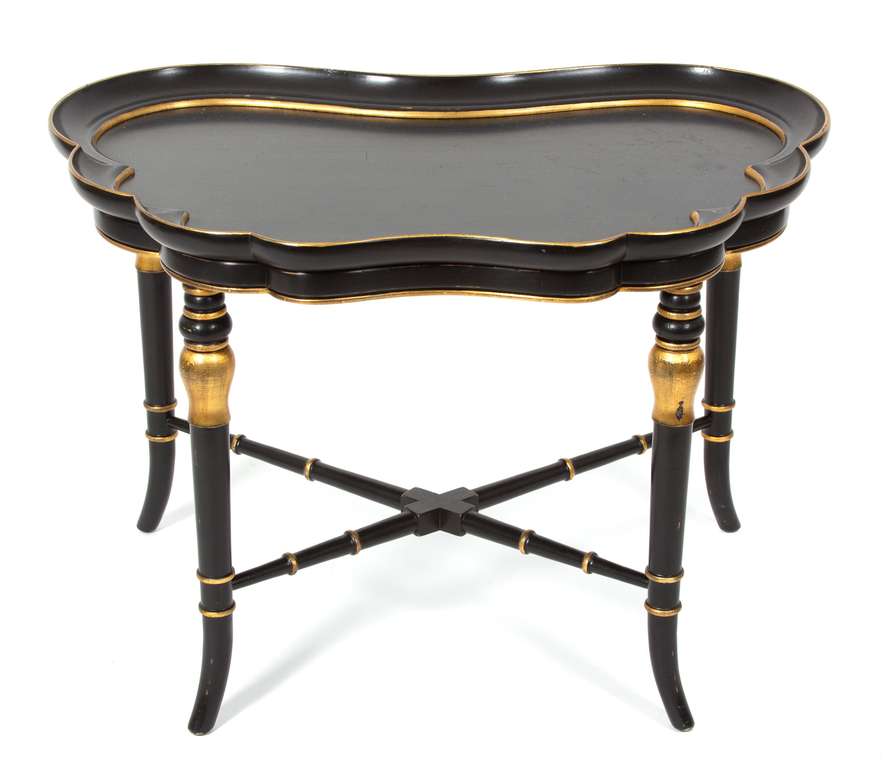 A Regency Style Black Lacquer Tray Top Table with Gilt Accents Height 20 3/4 x width 30 x depth 20 3/4 inches. — 20TH CENTURY