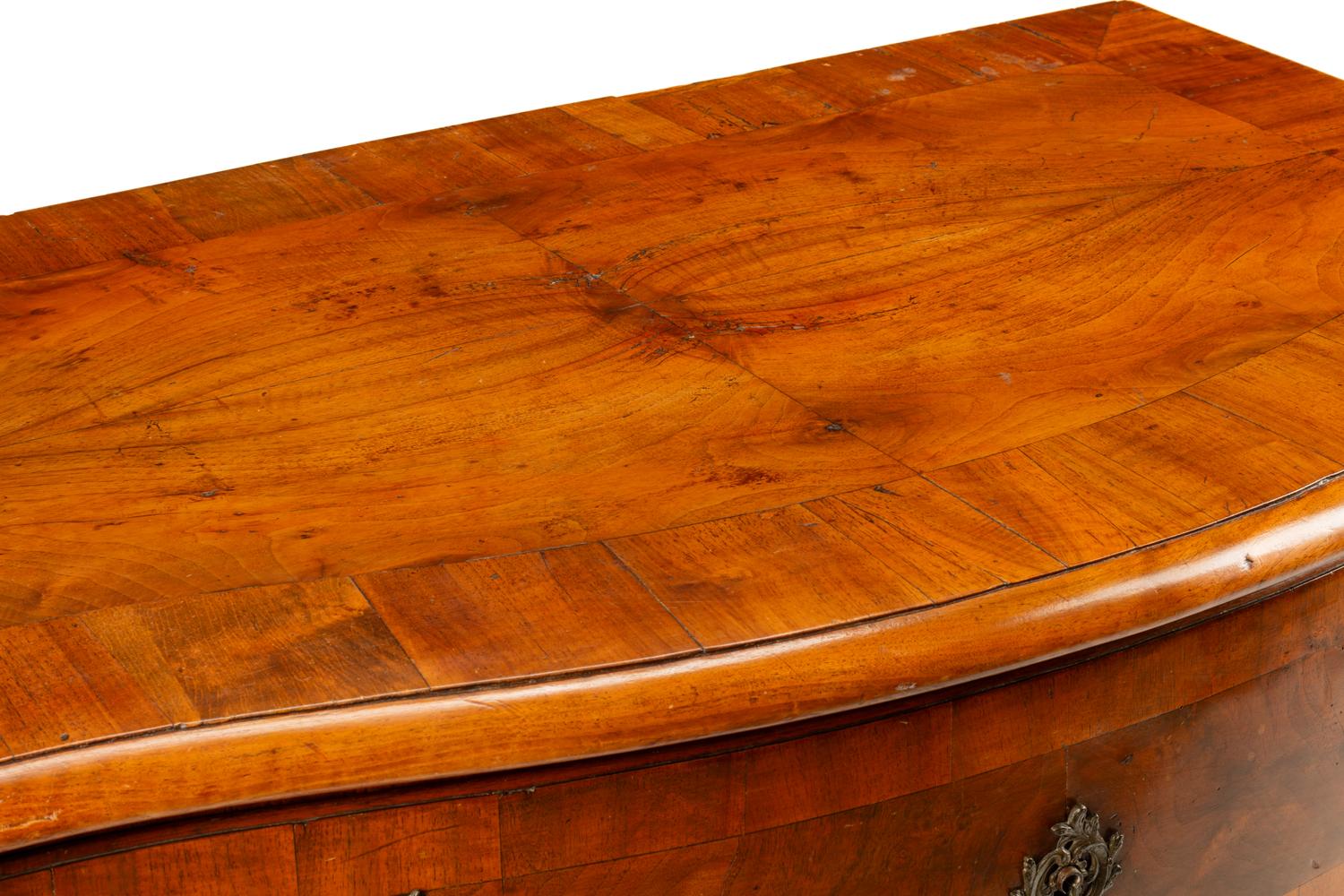 A Continental Walnut Commode