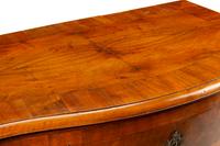 A Continental Walnut Commode