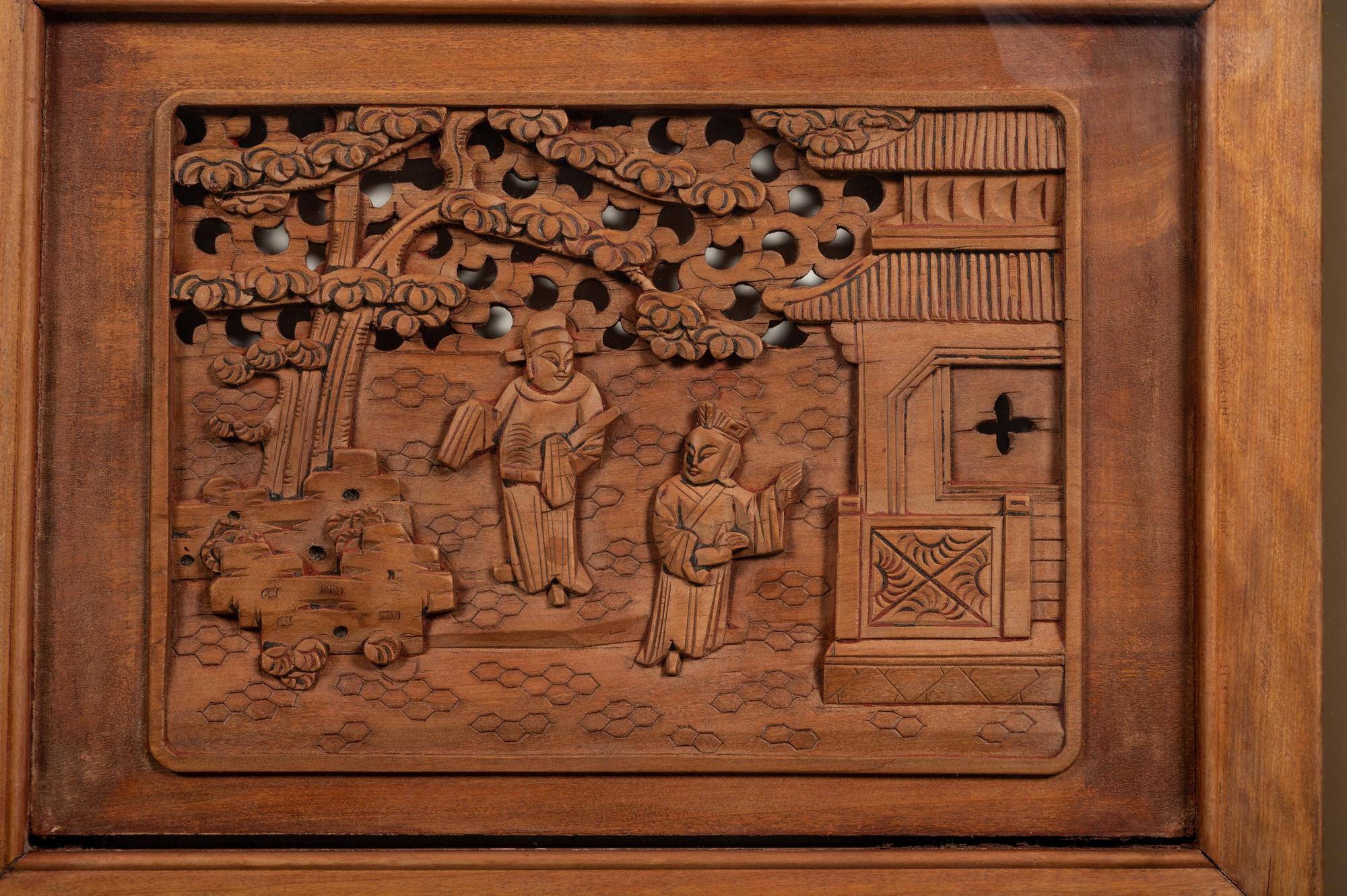 A Pair of Chinese Carved Wood Panels