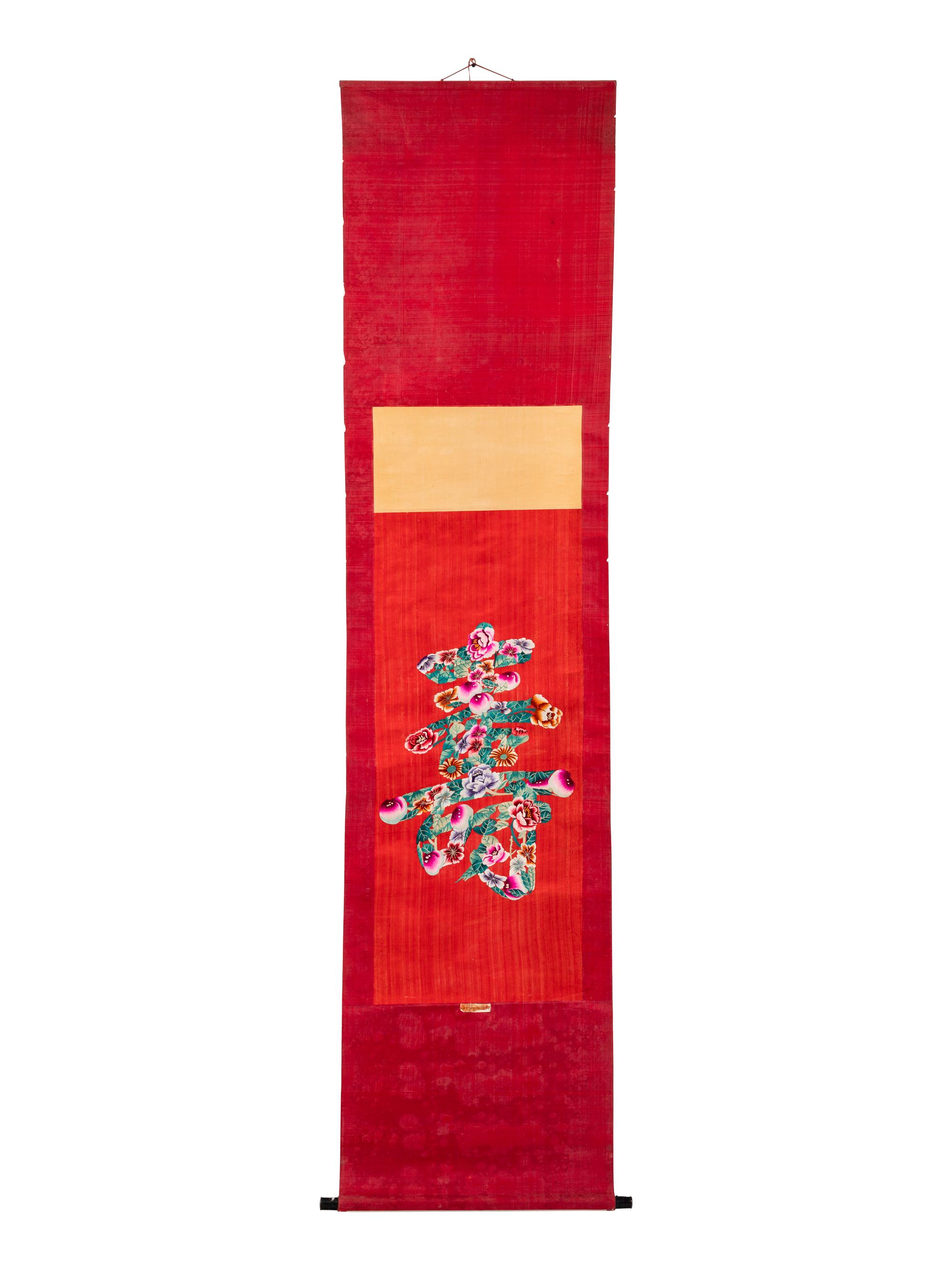 Two Chinese Red Ground Embroidered Silk 'Longevity' Panels