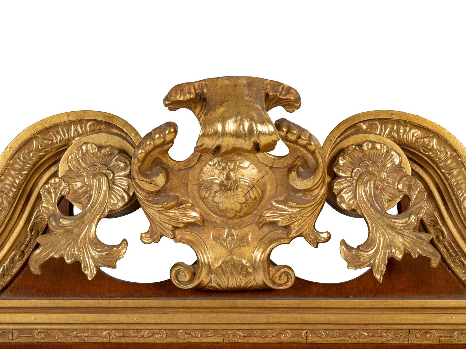 A George II Style Parcel Gilt Mahogany Mirror