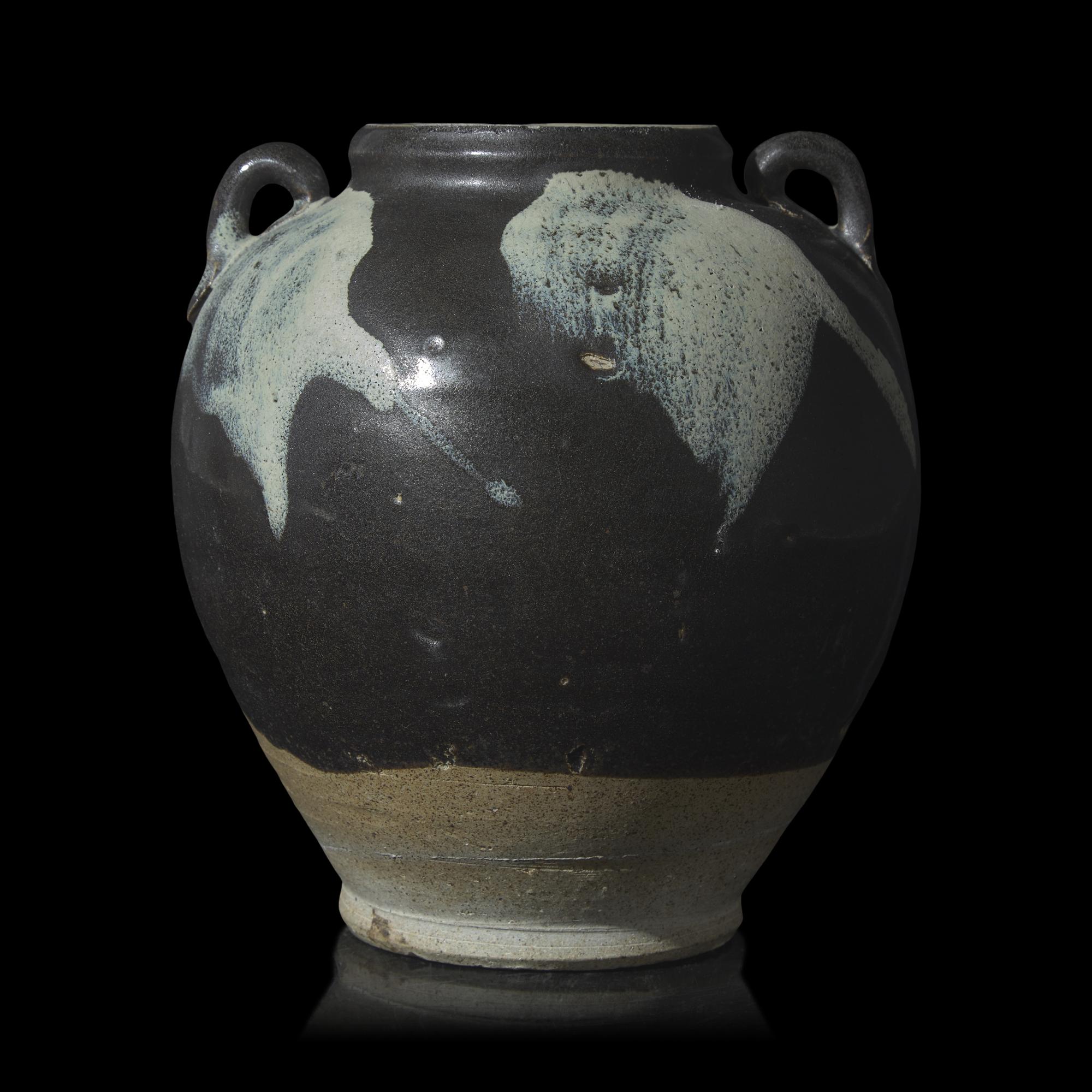 A Chinese Stoneware Phosphatic-Splashed Jar, Possibly Tang Dynasty 或爲唐 魯山窯黑釉撒白斑雙繫罐