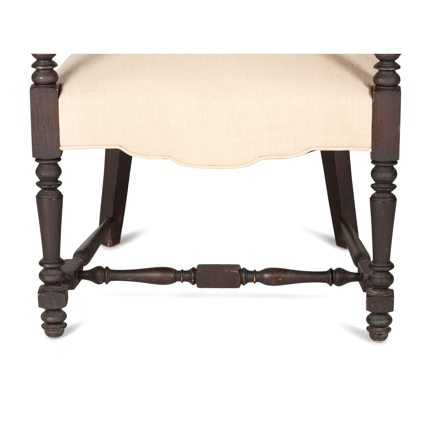 A William IV Carved and Turned Walnut Stretcher Base Library Armchair