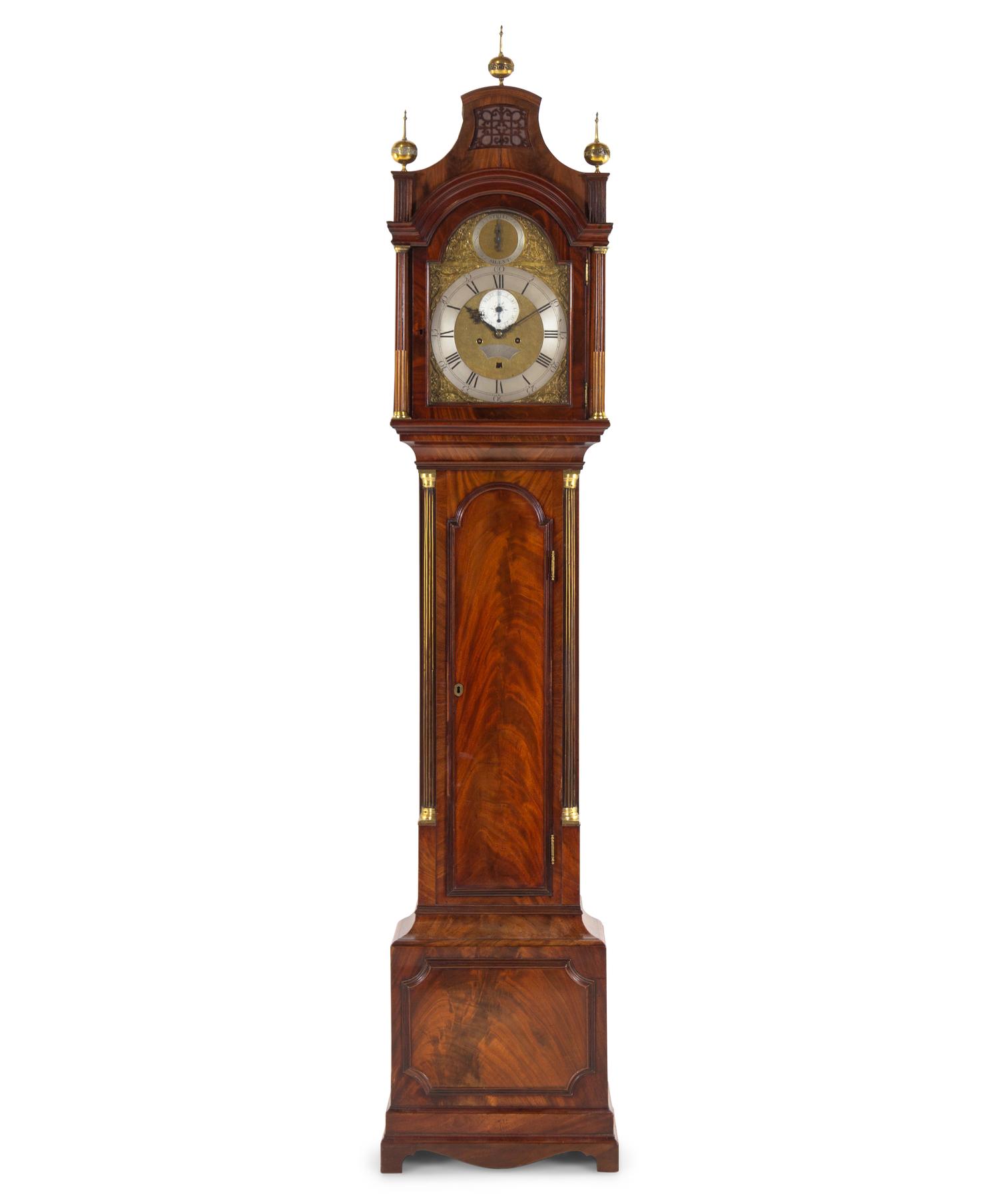 A George III Brass Mounted and Figured Mahogany Tall Case Clock