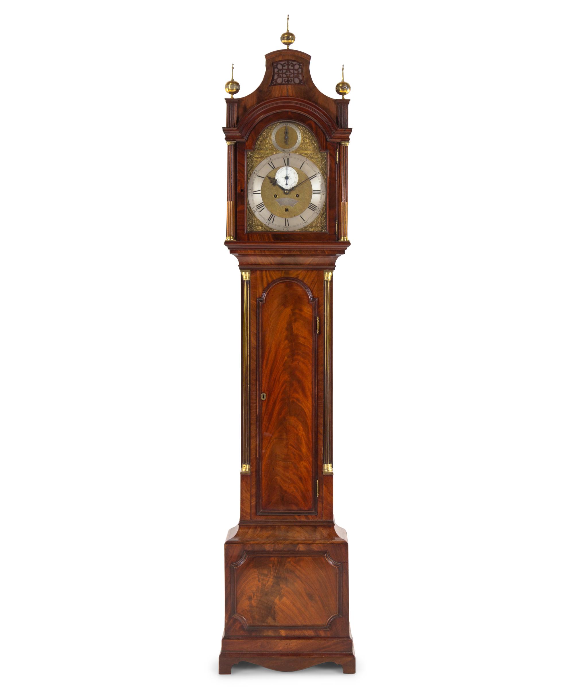 A George III Brass Mounted and Figured Mahogany Tall Case Clock