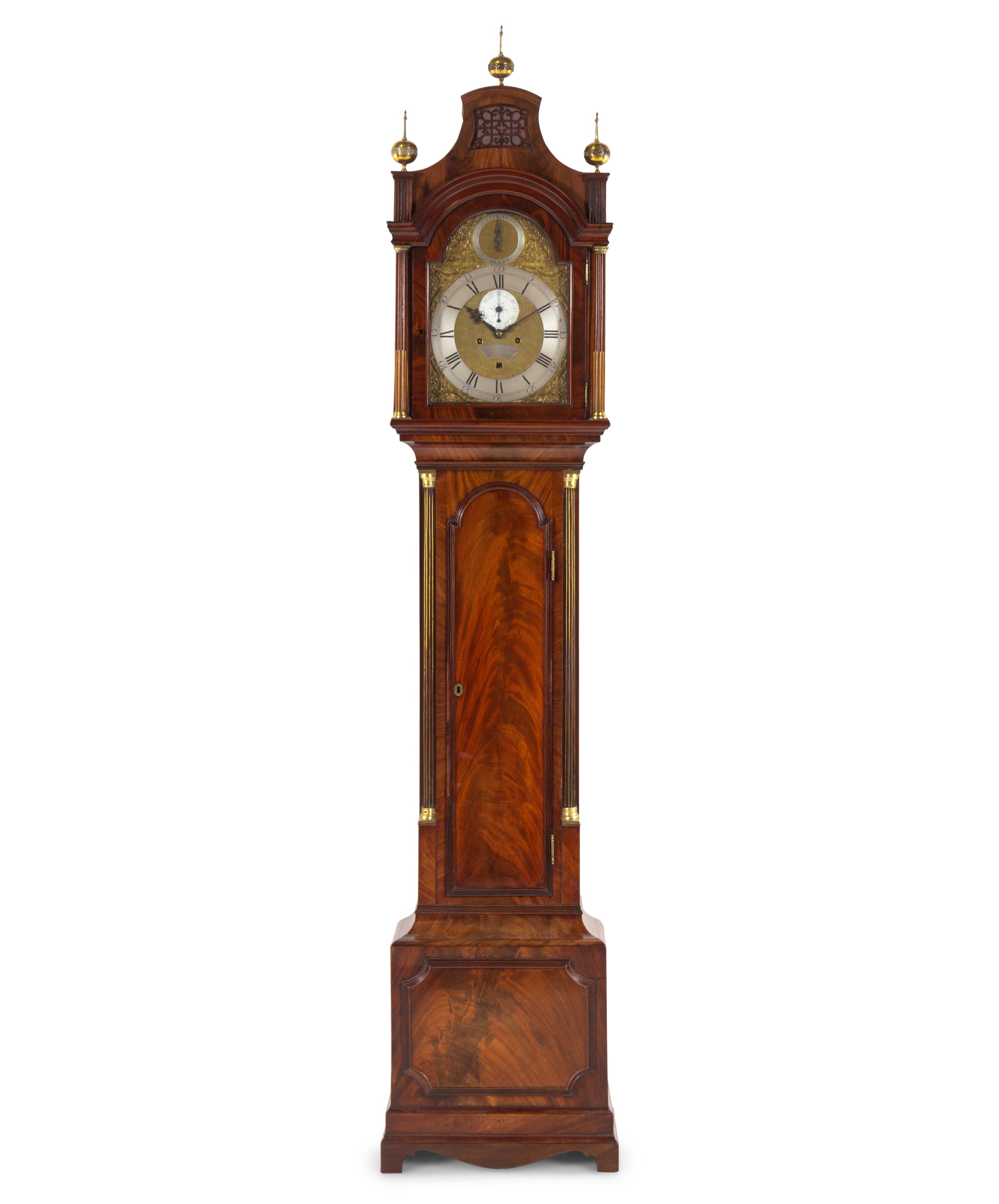 A George III Brass Mounted and Figured Mahogany Tall Case Clock