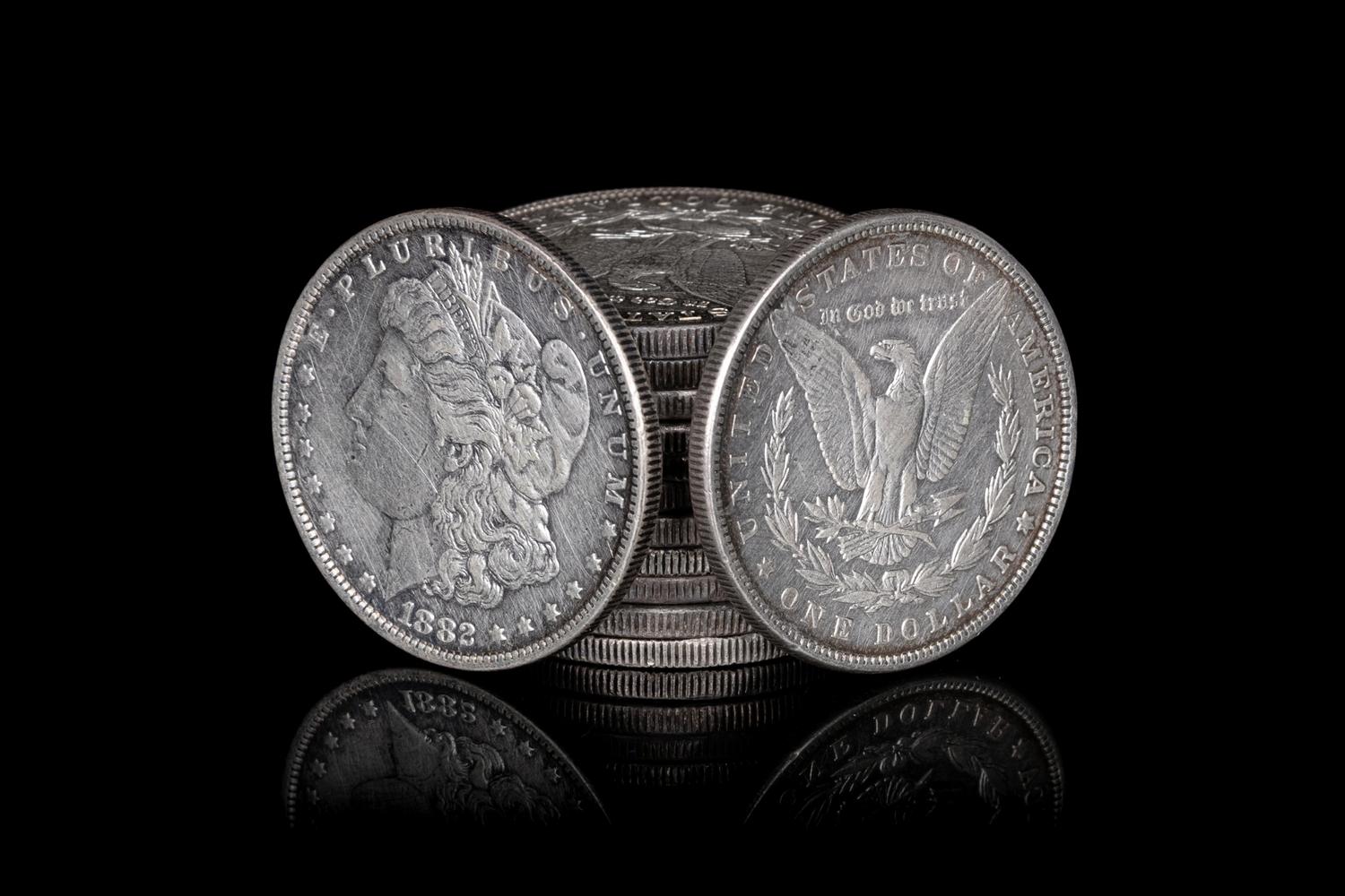 A Group of Thirteen Morgan $1 Coins