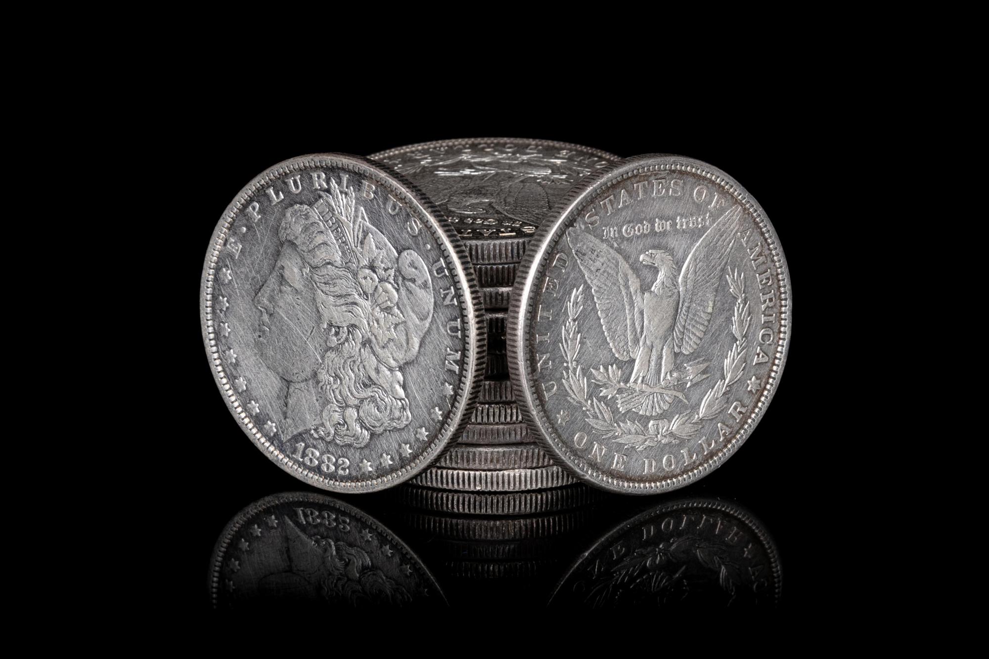 A Group of Thirteen Morgan $1 Coins