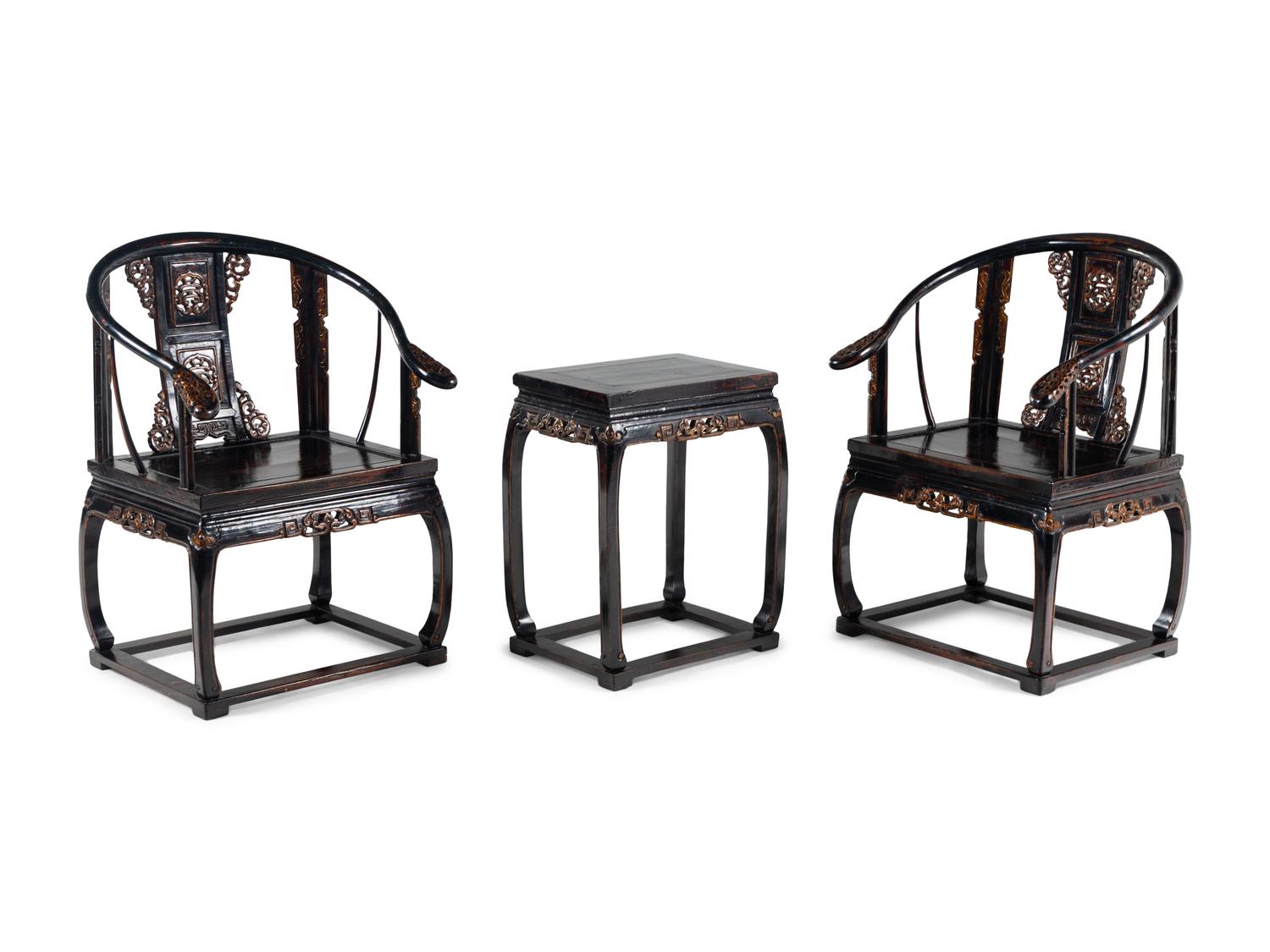 A Pair of Chinese Gilt Highlighted Black Lacquered Wood Armchairs and A Matching Rectangular Stand