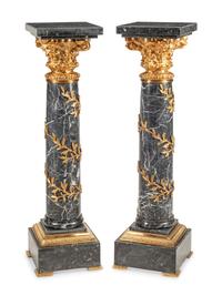 A Pair of Continental Gilt Bronze Mounted Marble Pedestals