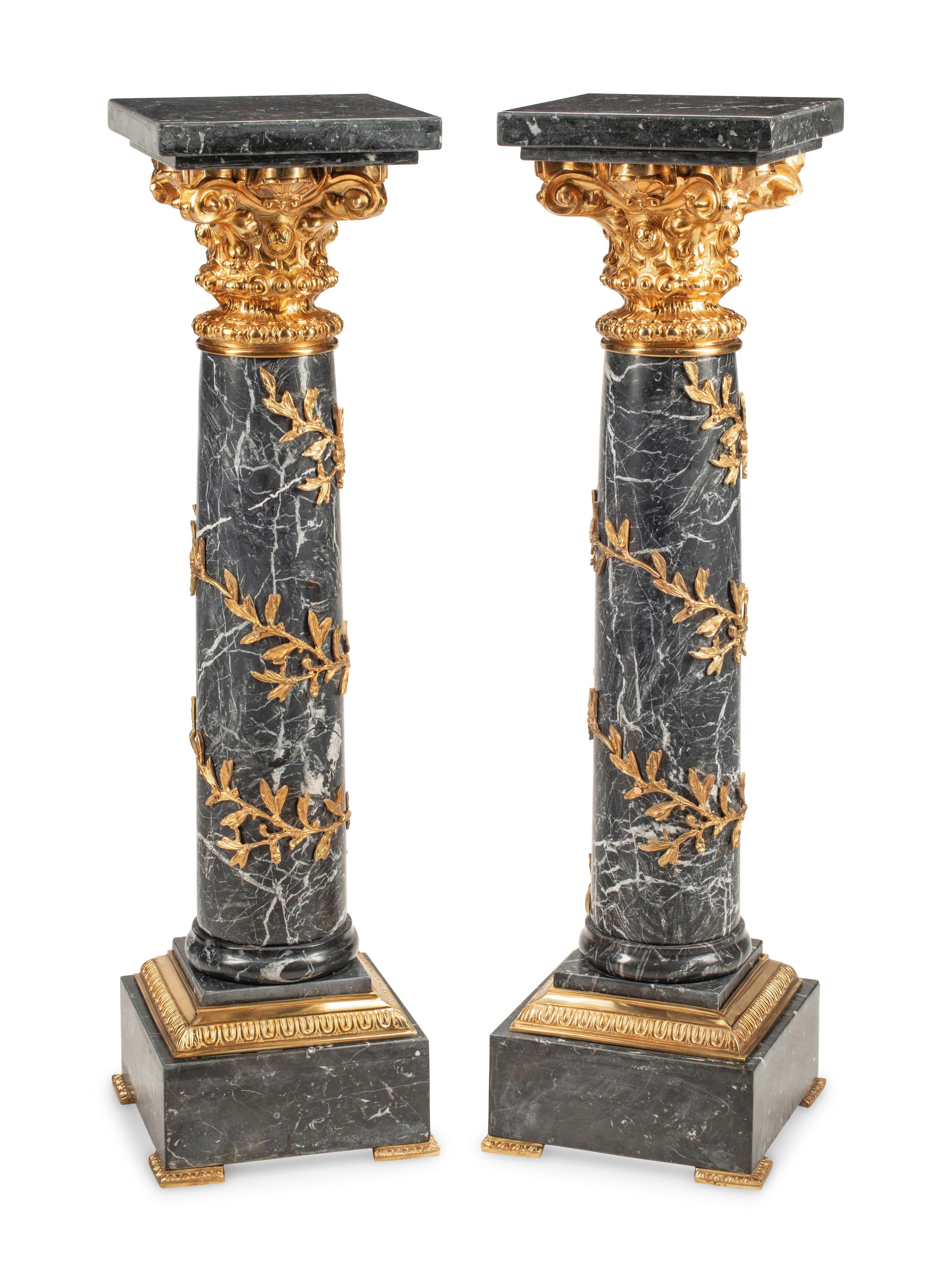 A Pair of Continental Gilt Bronze Mounted Marble Pedestals