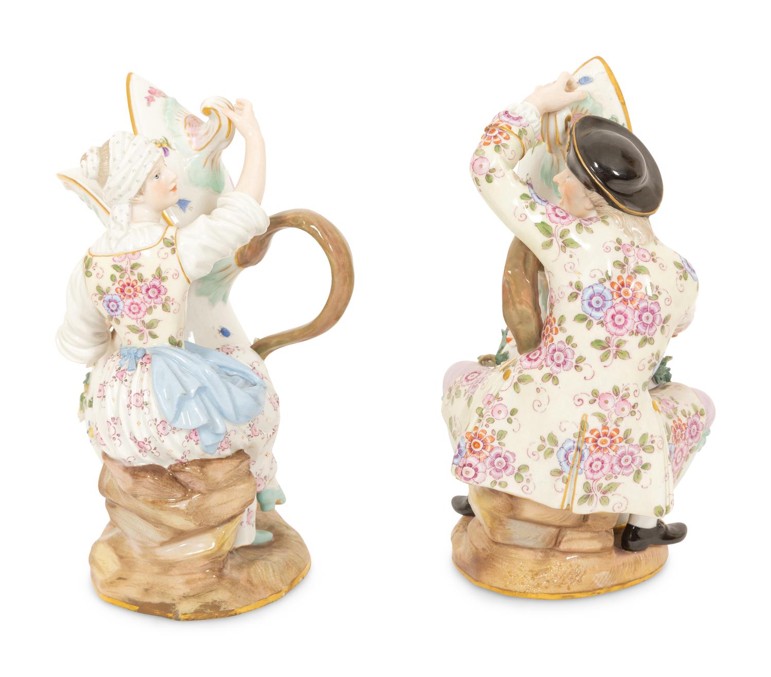 A Pair of Meissen Porcelain Figural Ewers