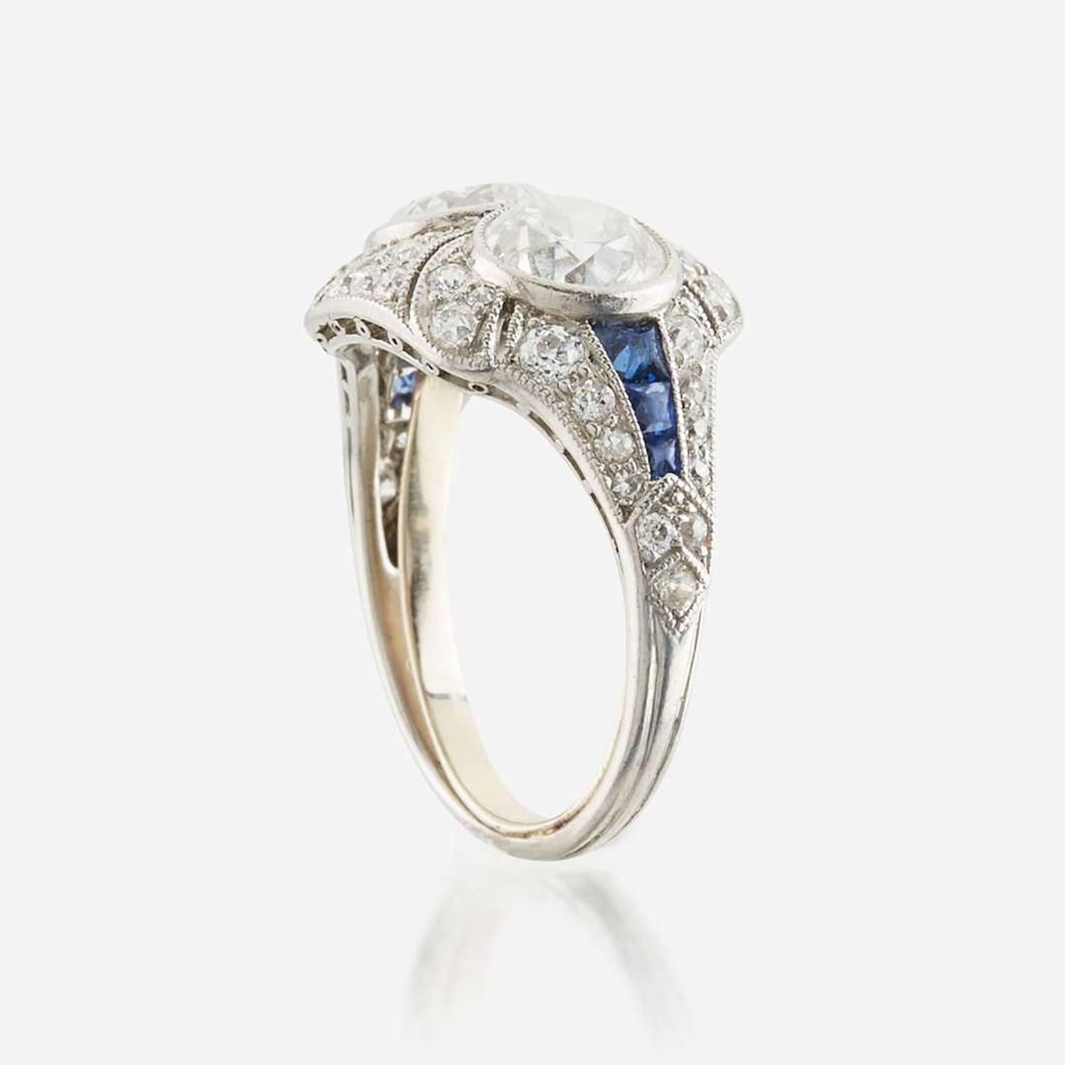 A diamond, sapphire, and platinum ring, J. E. Caldwell & Co.