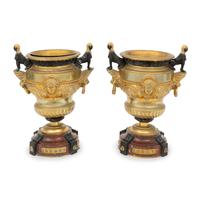 A Pair of French Egyptian Revival Gilt Bronze and Marble Urns