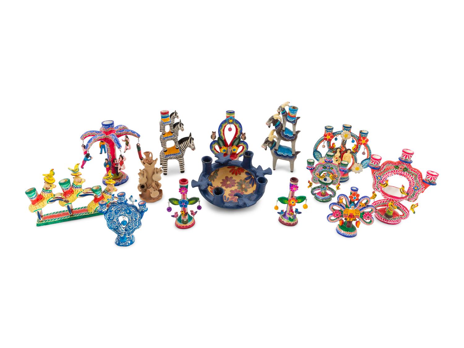 A Collection of Mexican Pottery Candelabra