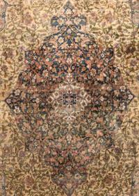 A Kashan Silk Carpet