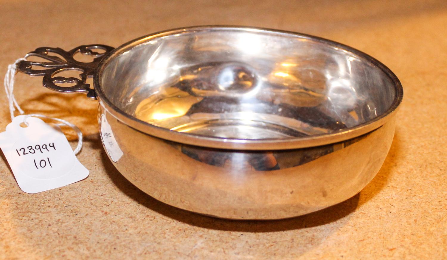 An American Silver Porringer, S. Kirk & Son, Baltimore, MD, having a pierced handle.