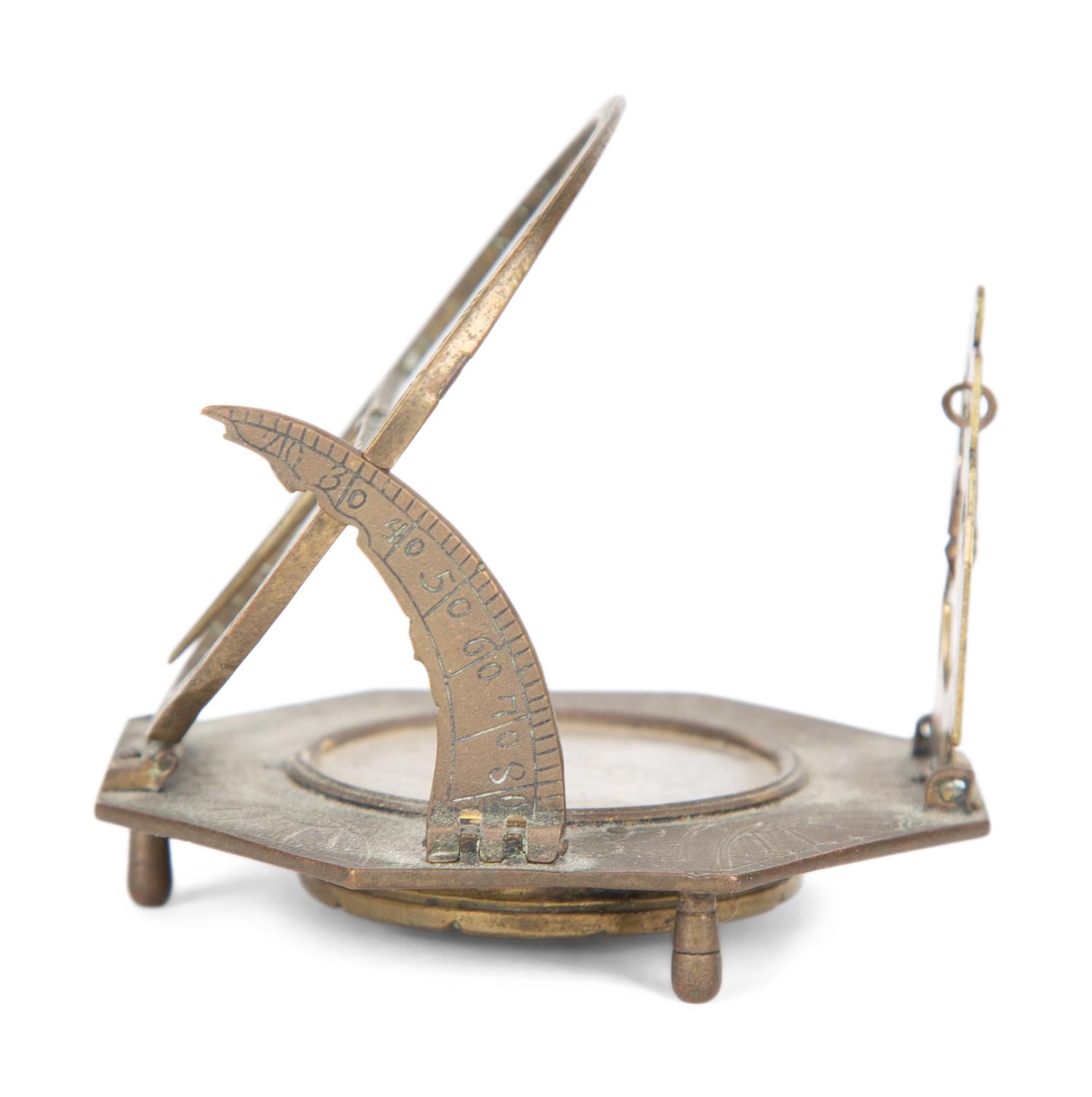 An English Brass Lantern Clock and A Sundial/Compass