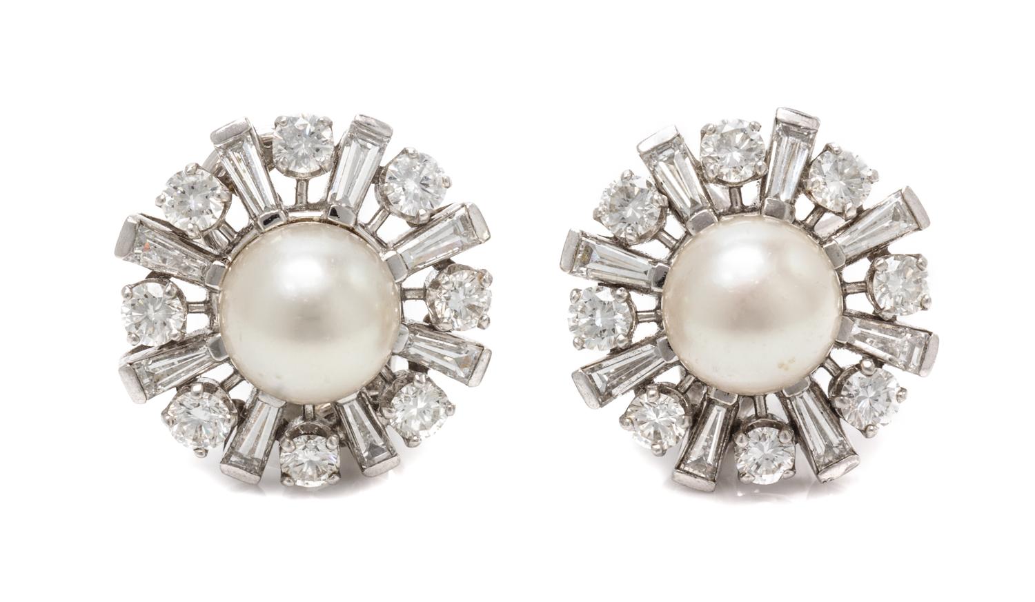 A Pair of Platinum, Diamond and Cultured Pearl Earclips, 8.60 dwts.