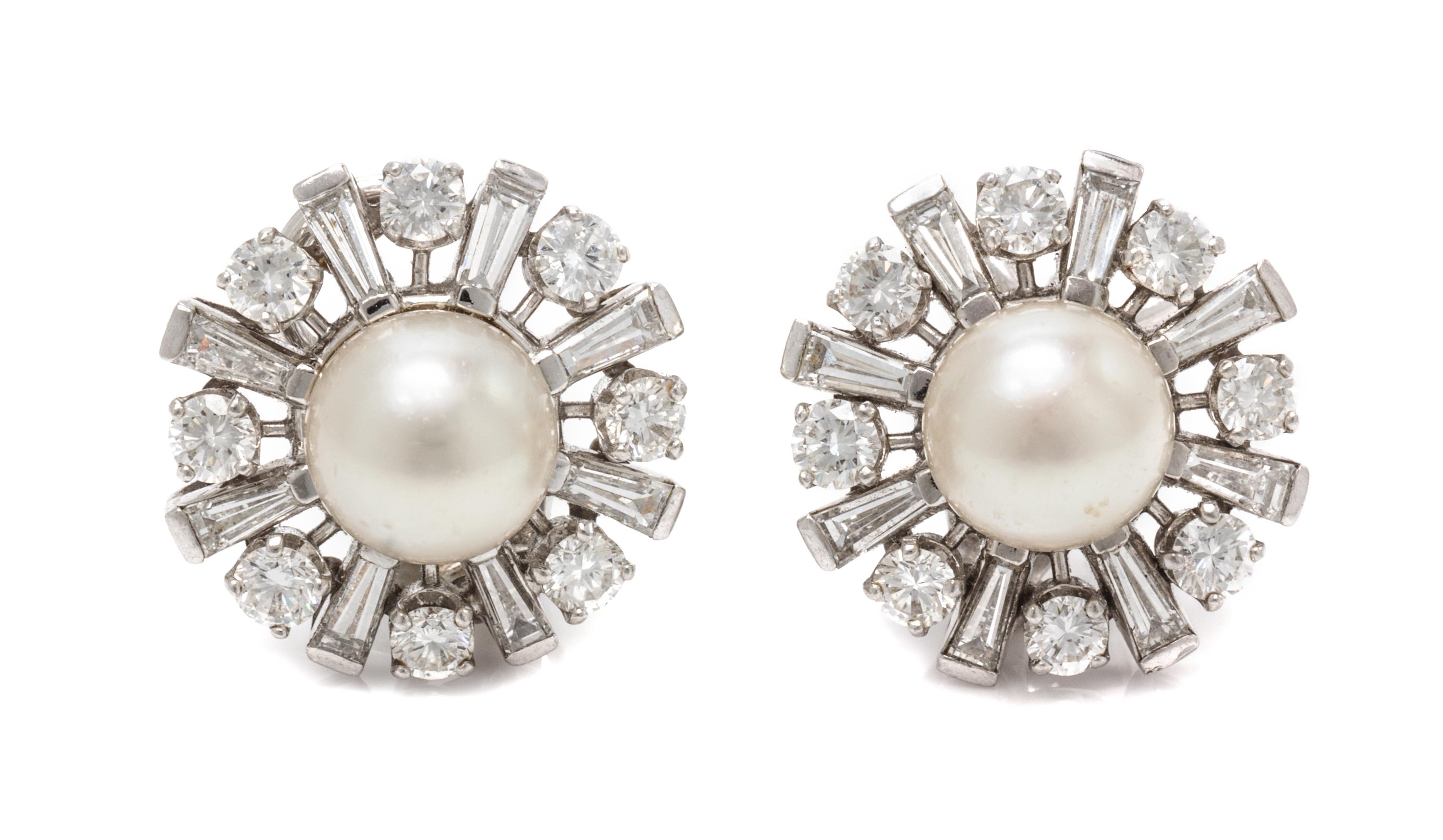 A Pair of Platinum, Diamond and Cultured Pearl Earclips, 8.60 dwts.