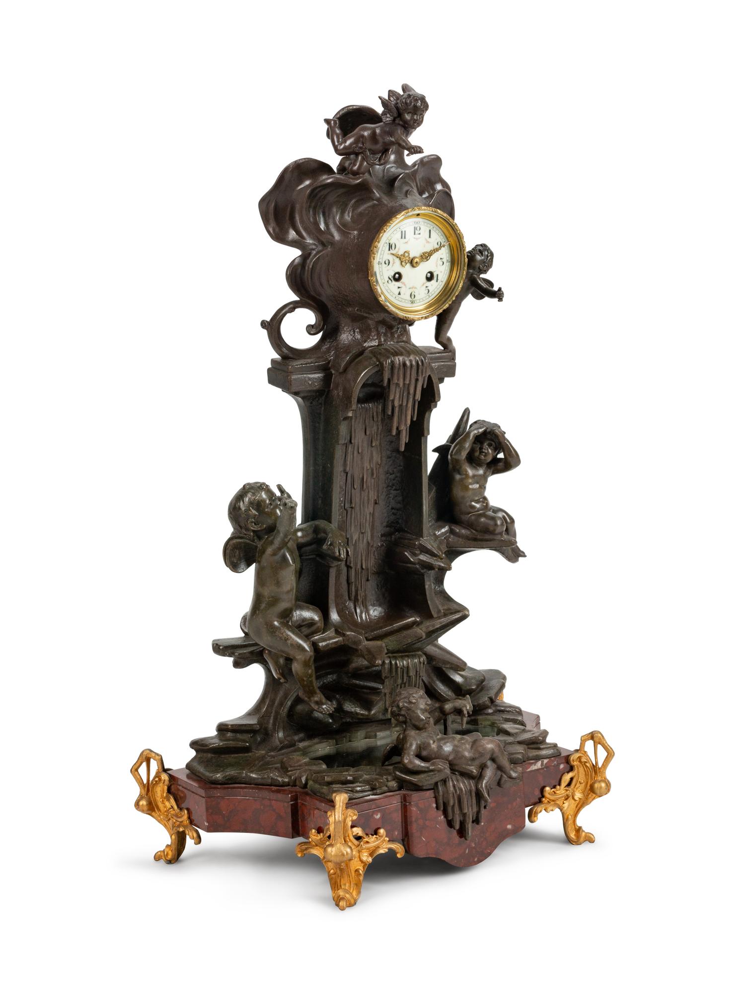 A French Patinated Bronze and Marble Mantel Clock — 19TH CENTURY