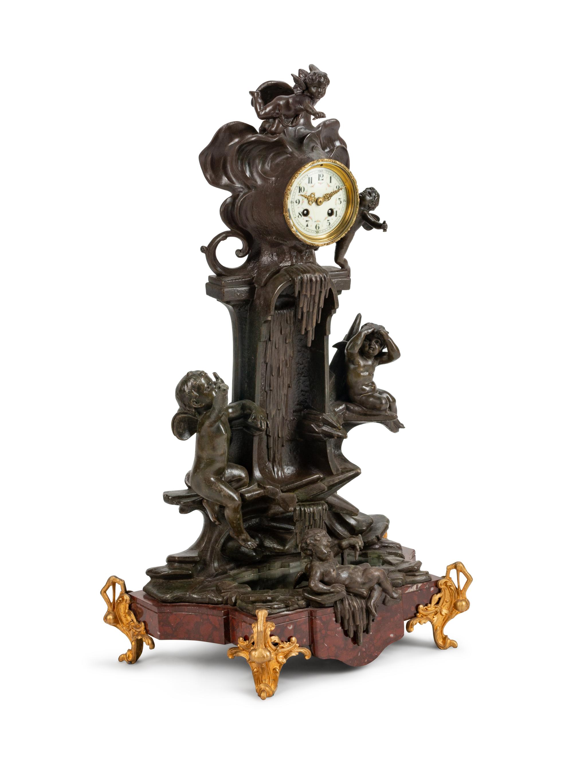 A French Patinated Bronze and Marble Mantel Clock — 19TH CENTURY