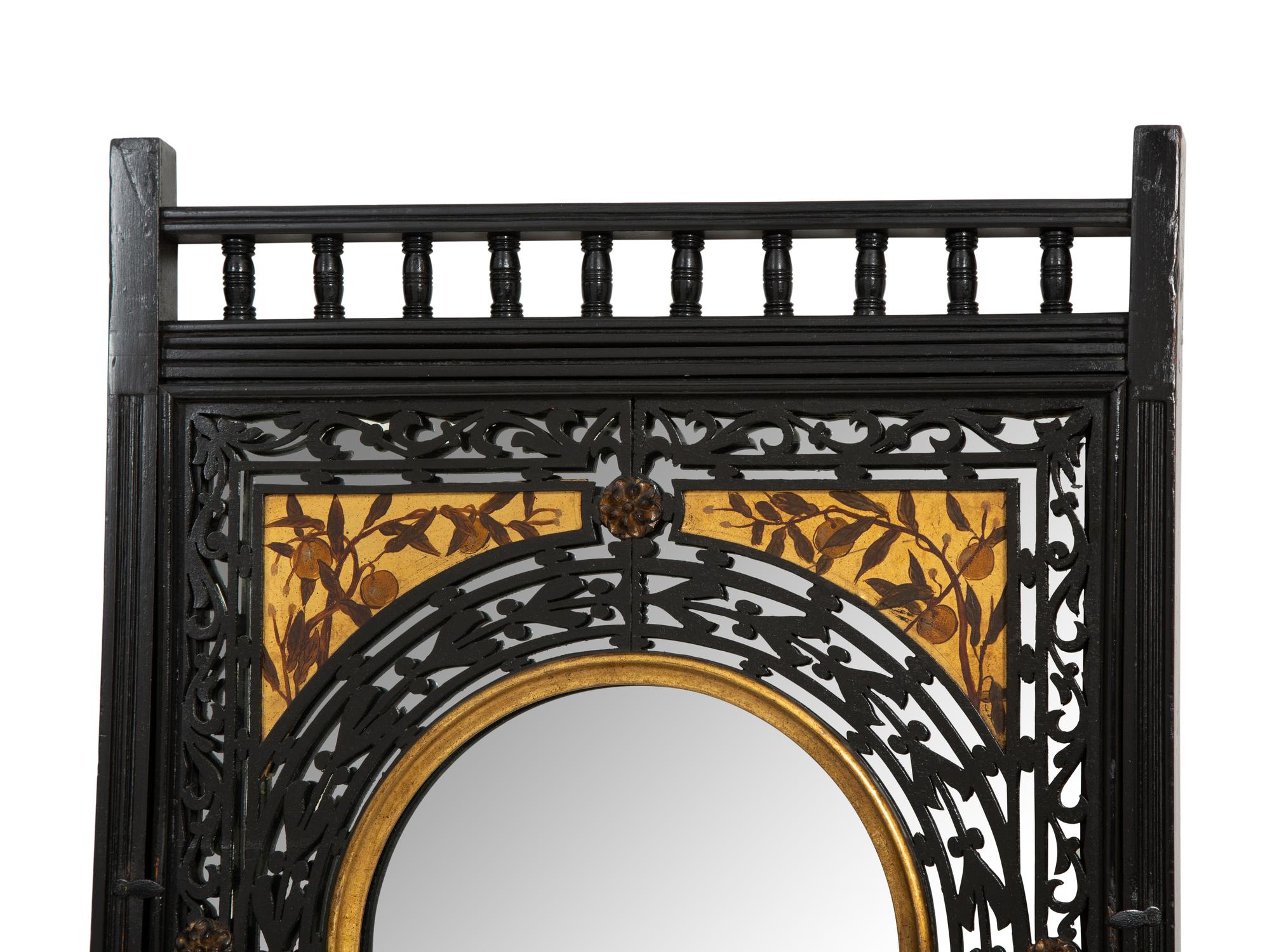 A Pair of Victorian Aesthetic Movement Ebonized, Painted and Parcel Gilt Mirrored Wall Brackets